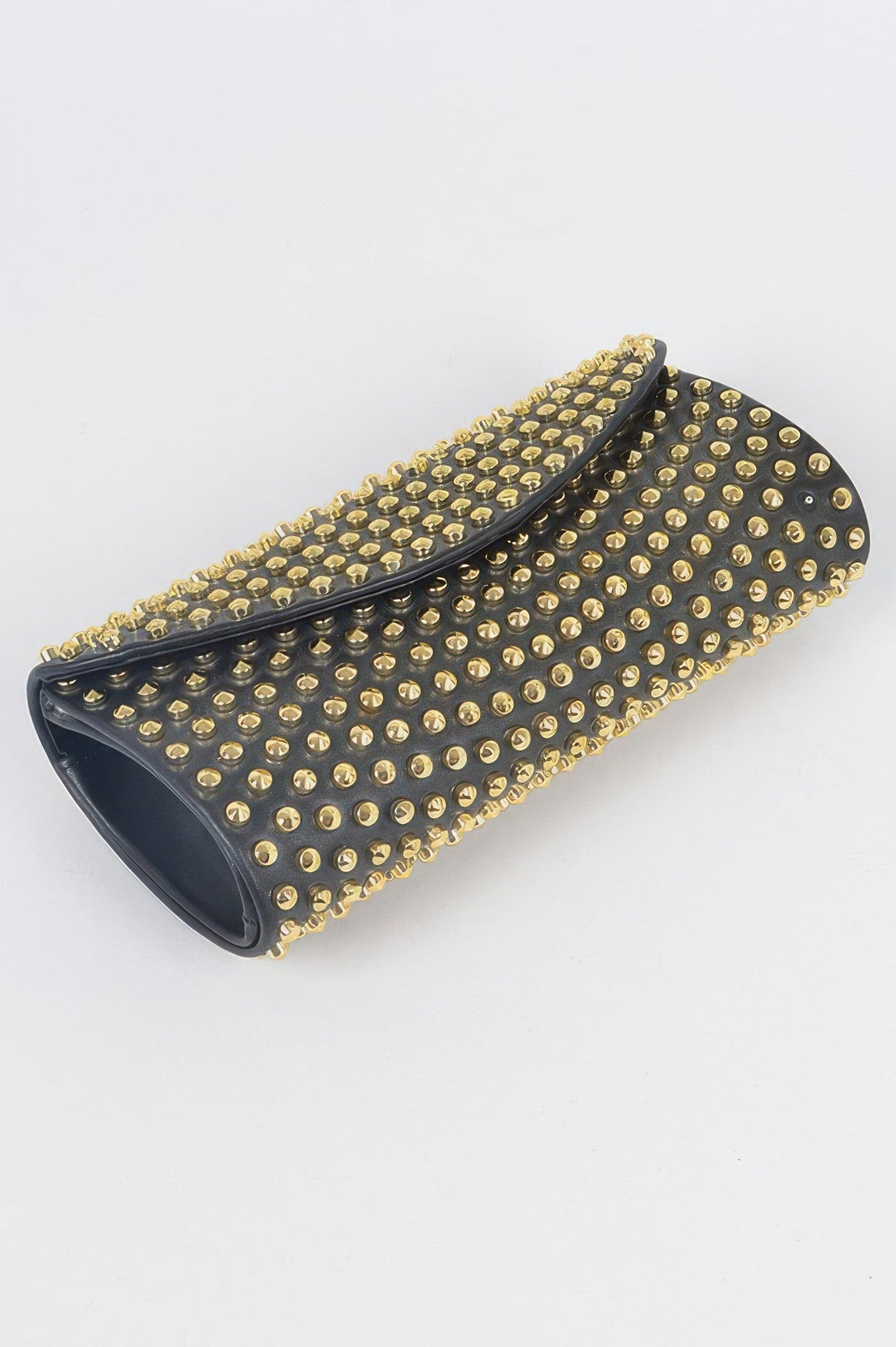 Black studded clutch end view with flap latch and gold studs