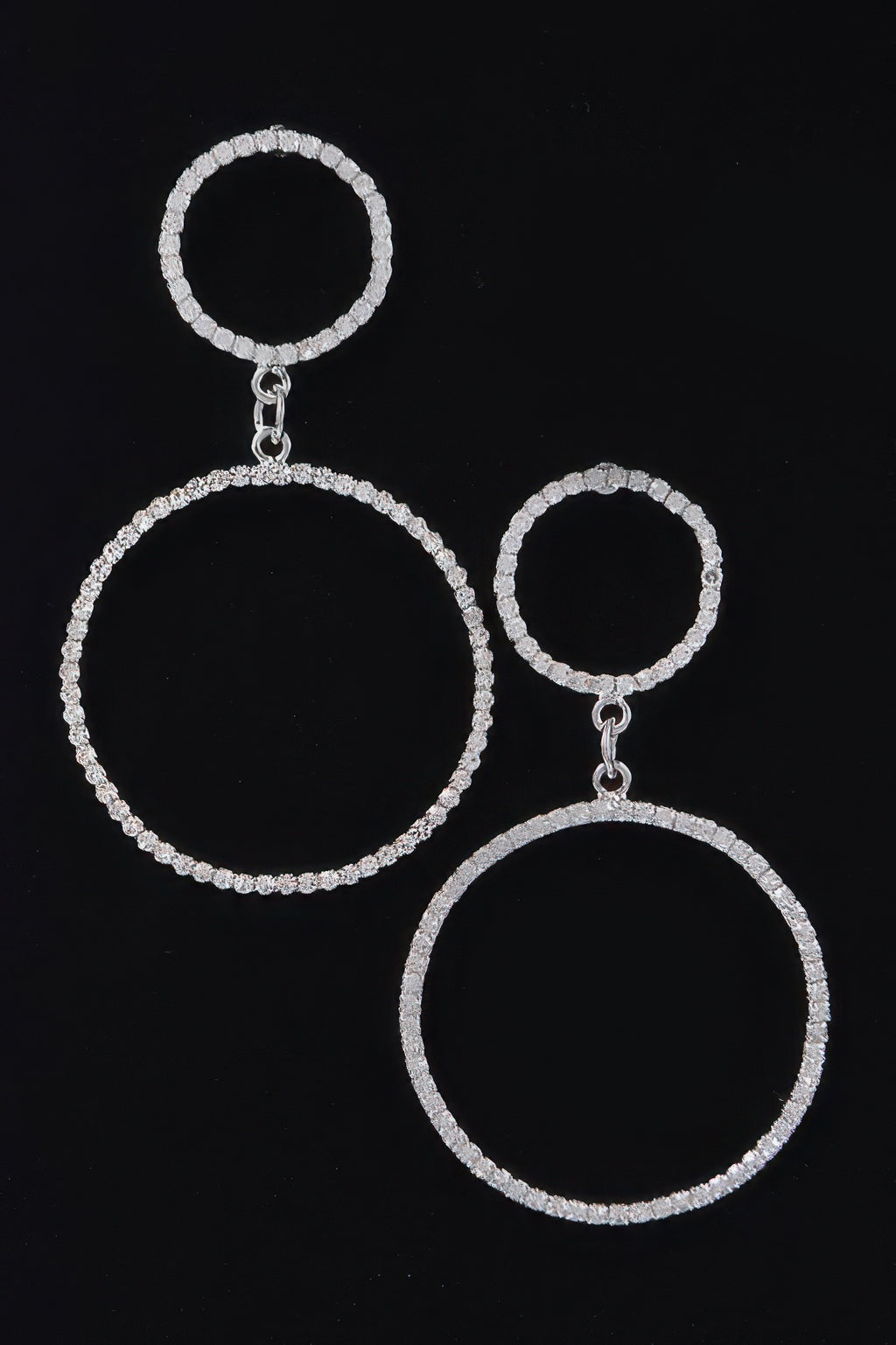 Circle rhinestone earrings with a small top ring and a larger bottom ring