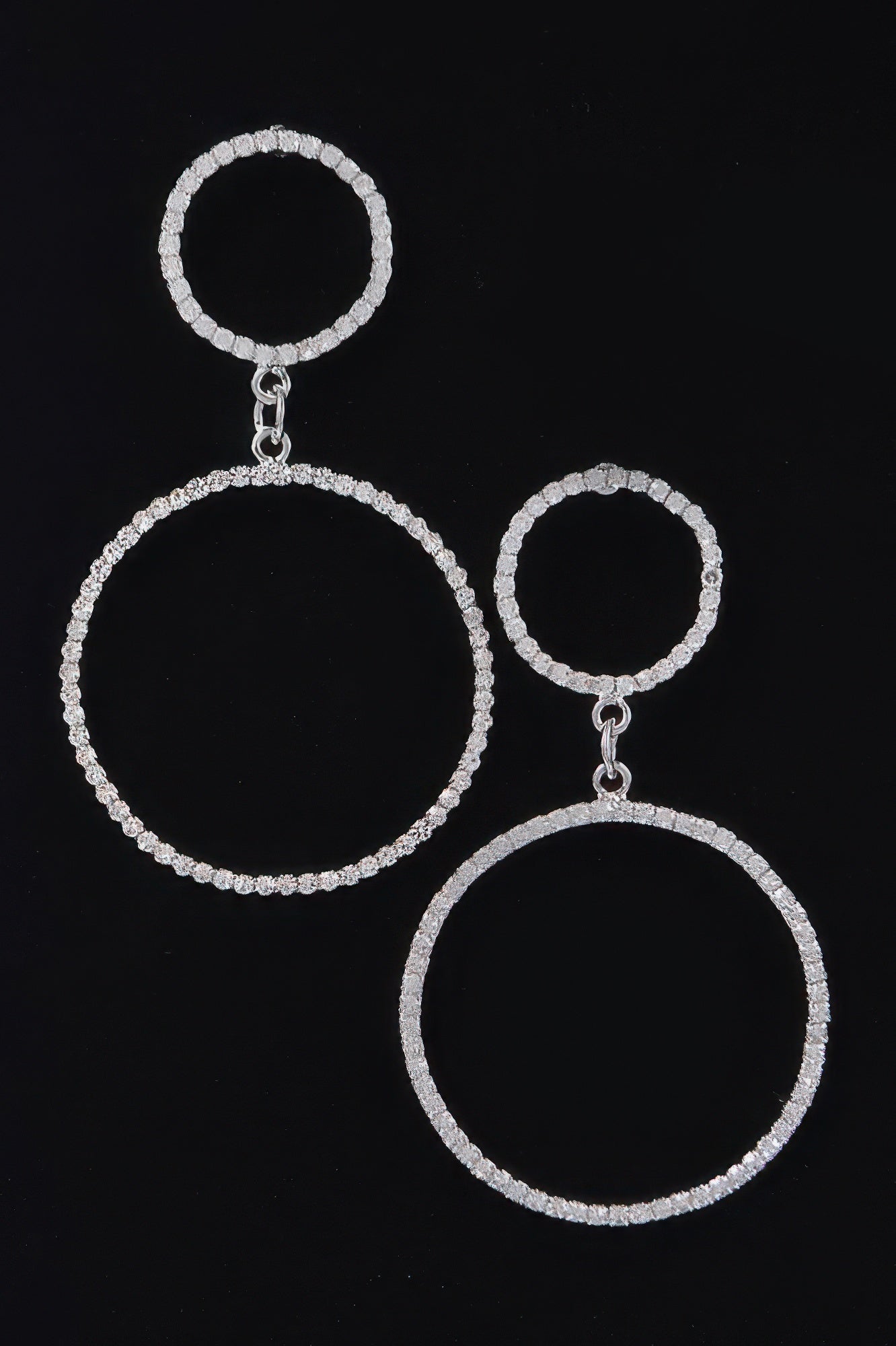 Circle rhinestone earrings with a small top ring and a larger bottom ring