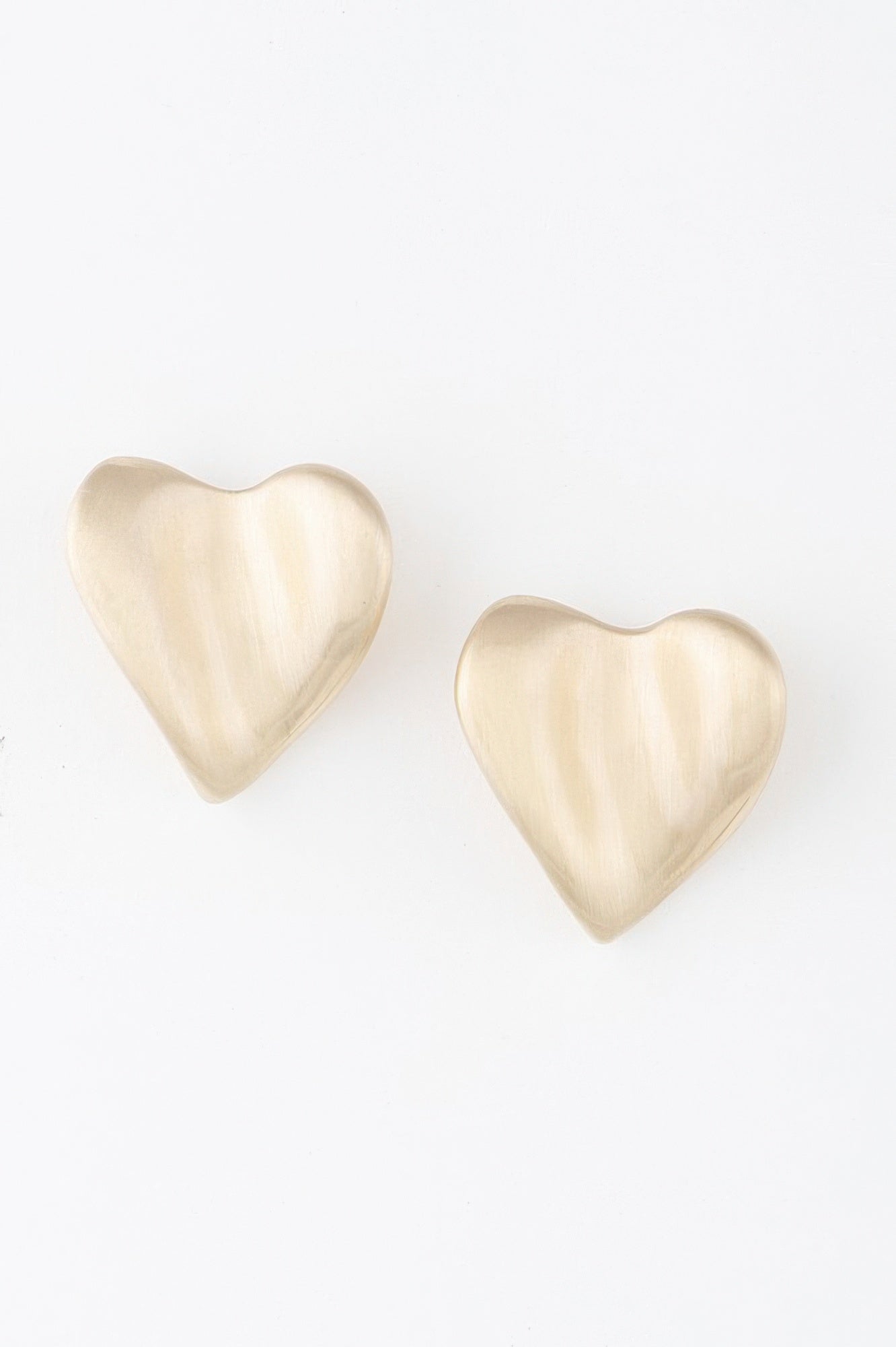 Abstract heart stud earrings, gold-tone finish, curved heart shape