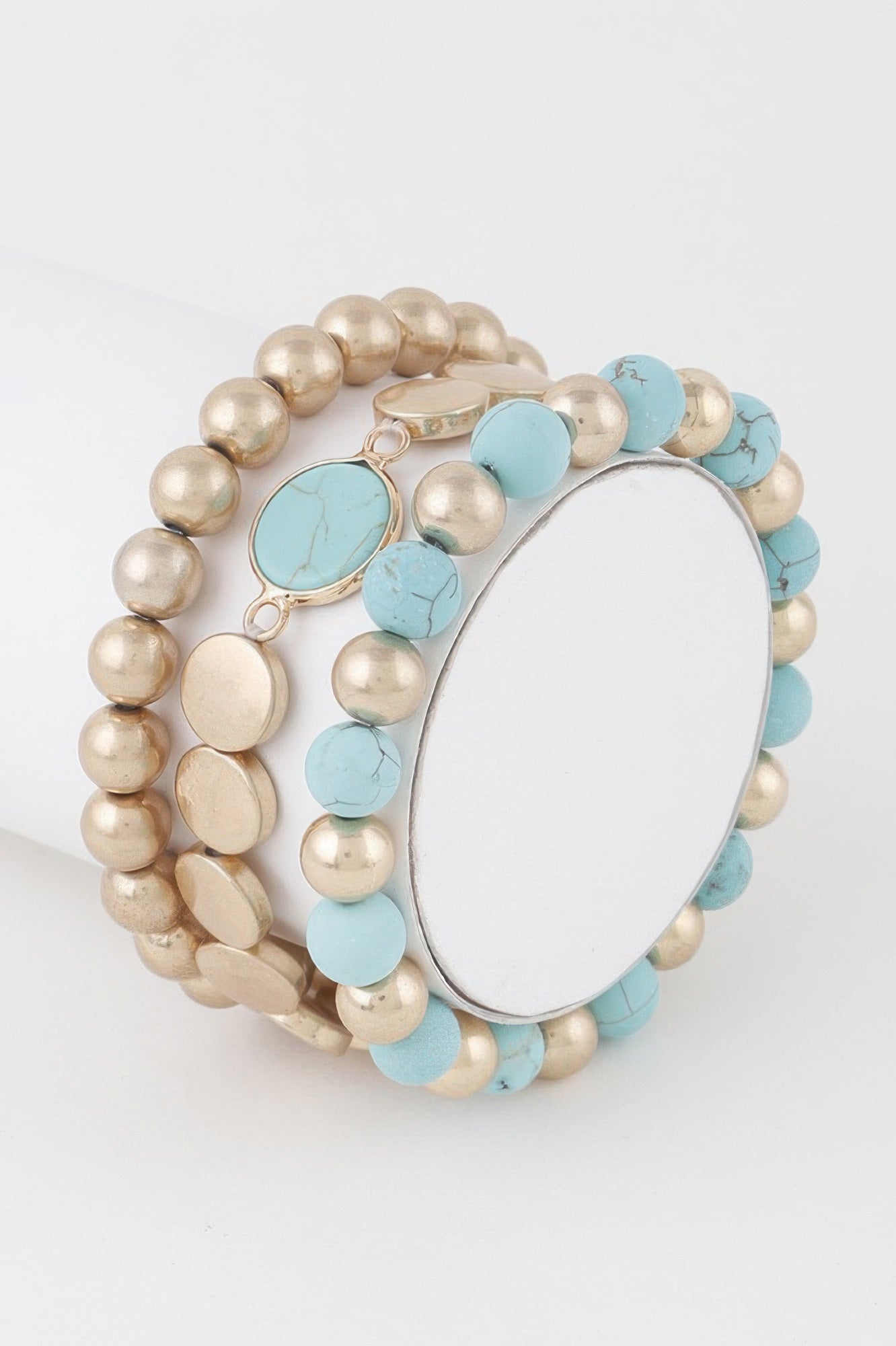 Multi Stone Beaded Bracelet: gold bead strands with light turquoise heart charm