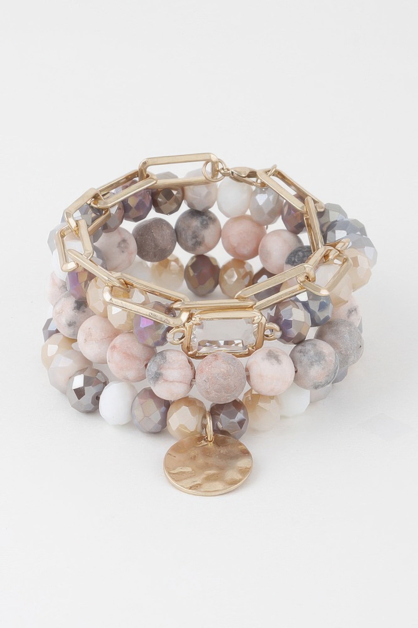 Multi-layer crystal beaded bracelet with gold chain links and round coin charm