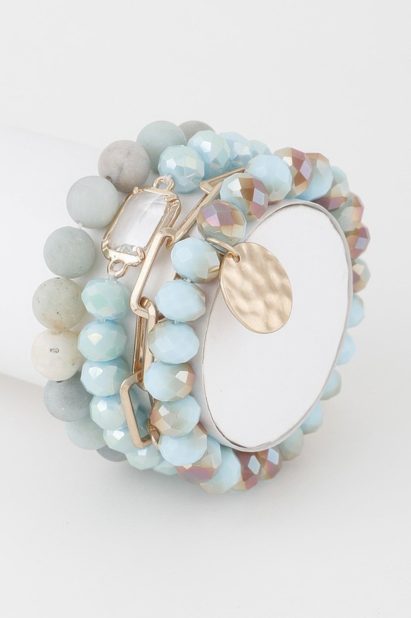 Light multicolor crystal beaded bracelet with light blue beads and gold bar clasp