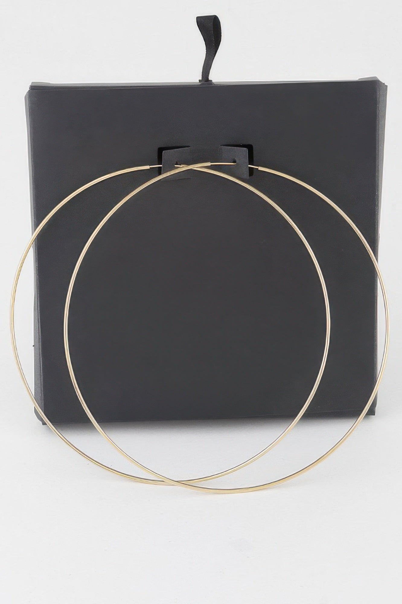 Wide gold metal hoop earrings with post backs