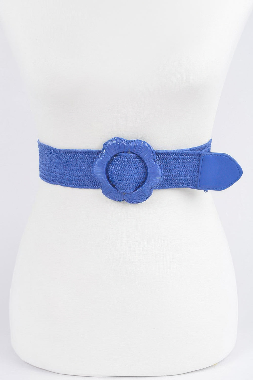 Faux straw elastic belt in cobalt blue with fabric flower centerpiece and tab buckle