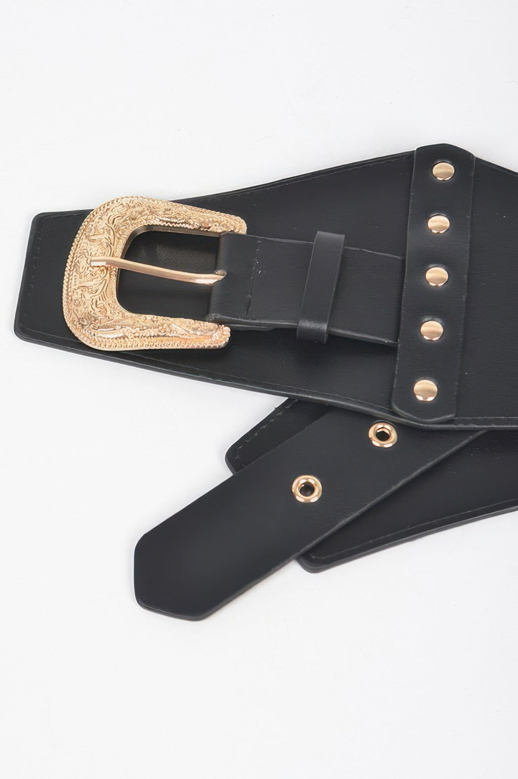 Close-up: black multi metal elastic belt with ornate gold-tone buckle