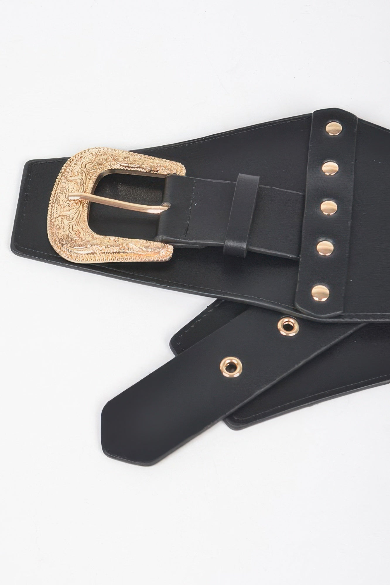Close-up: black multi metal elastic belt with ornate gold-tone buckle