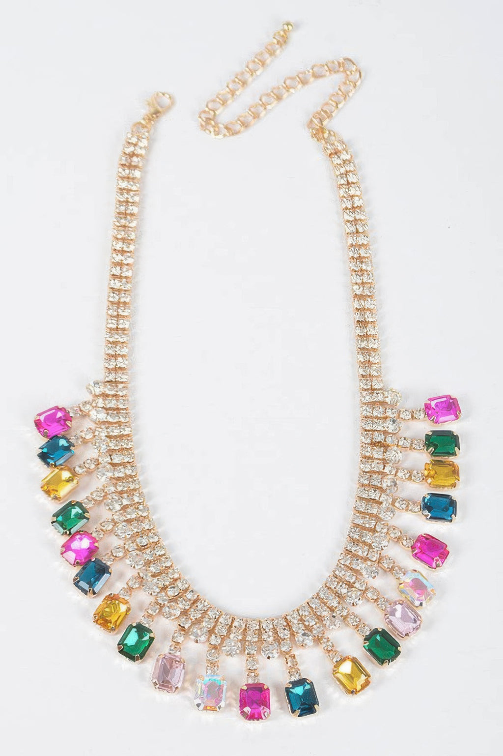 Gold-tone rhinestone choker with multicolor crystal drops on a clear-stone band