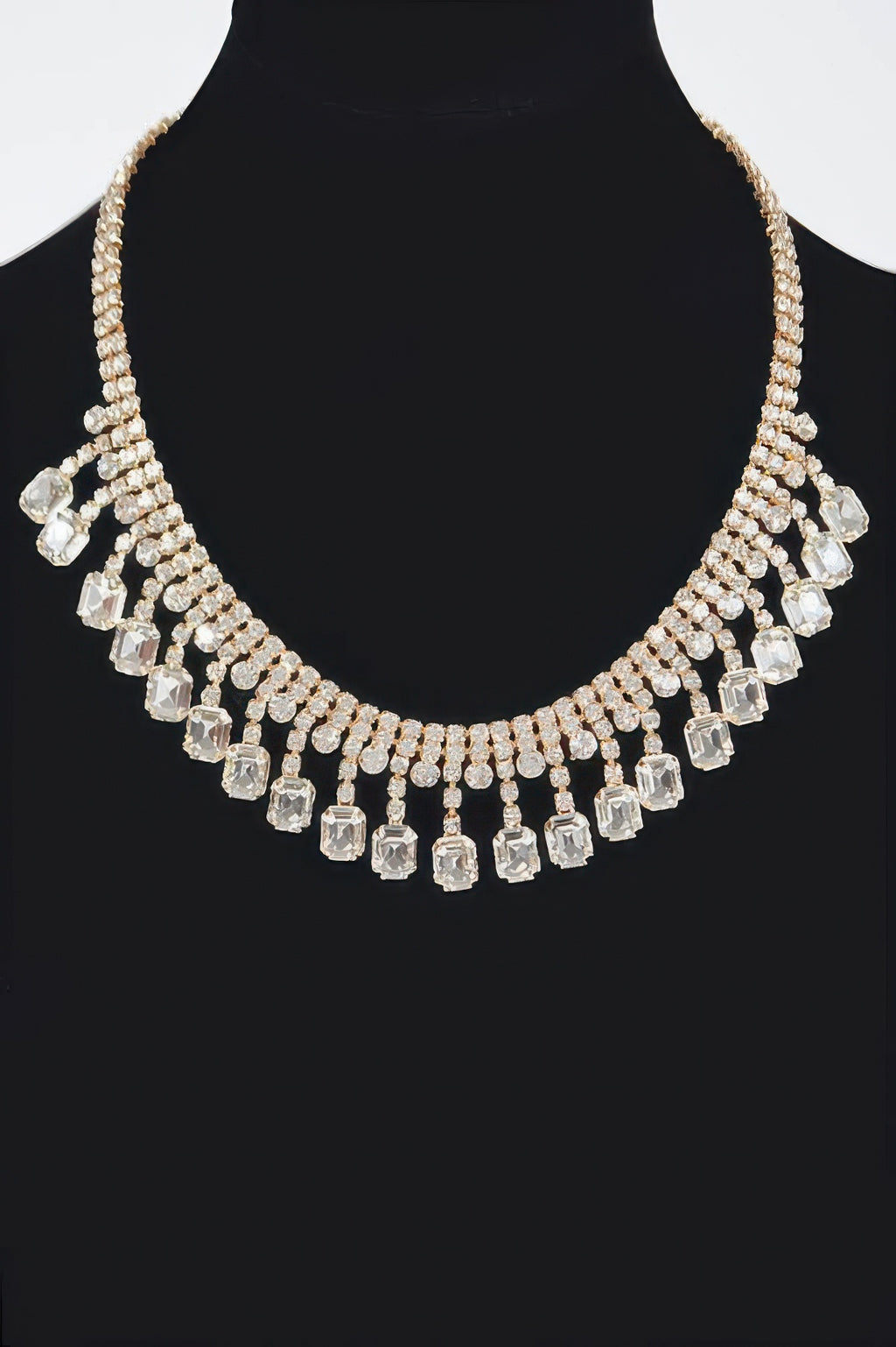 Clear rhinestone choker with gold-tone setting and dangling crystal rectangles