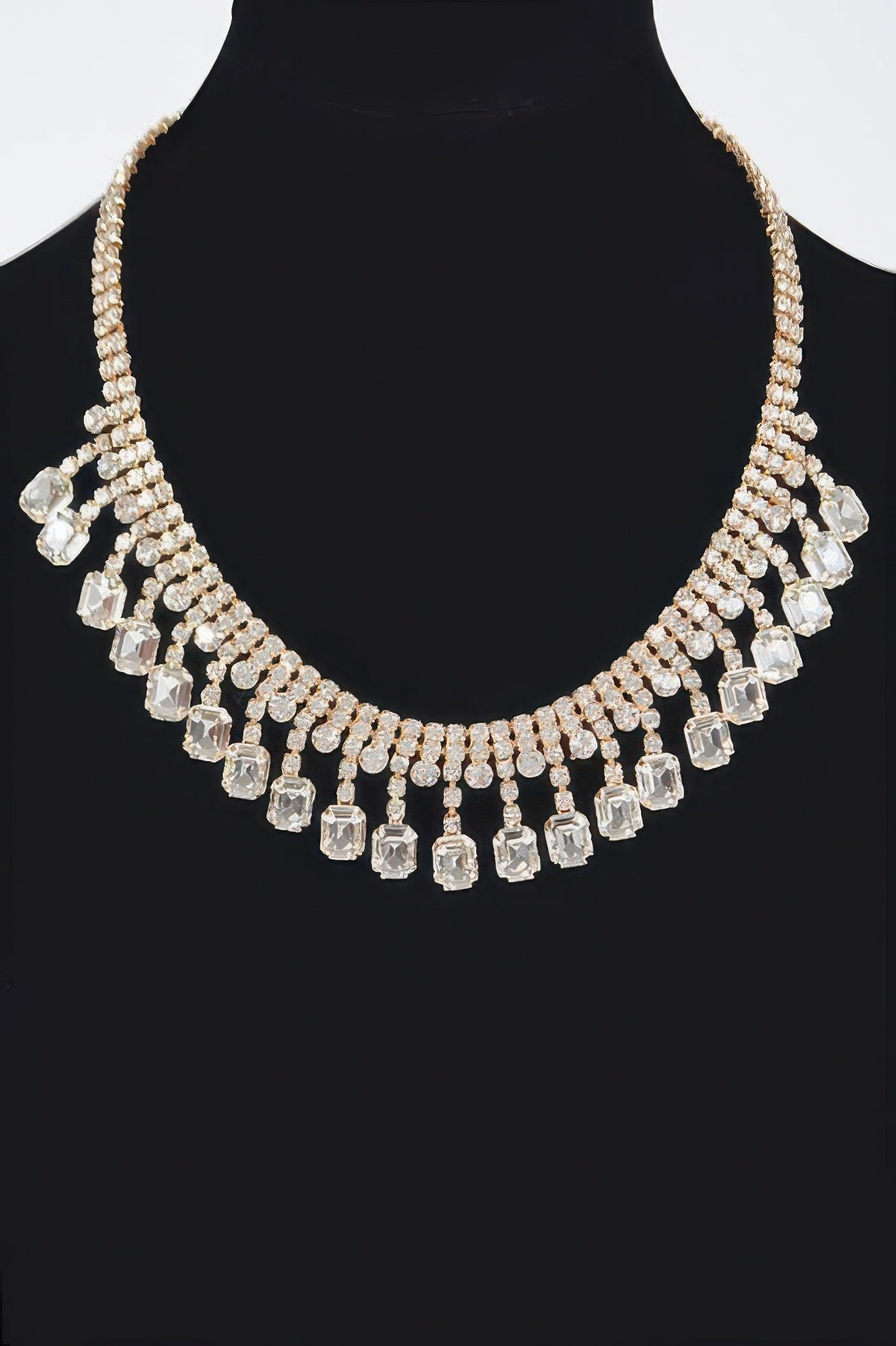 Clear rhinestone choker with gold-tone setting and dangling crystal rectangles