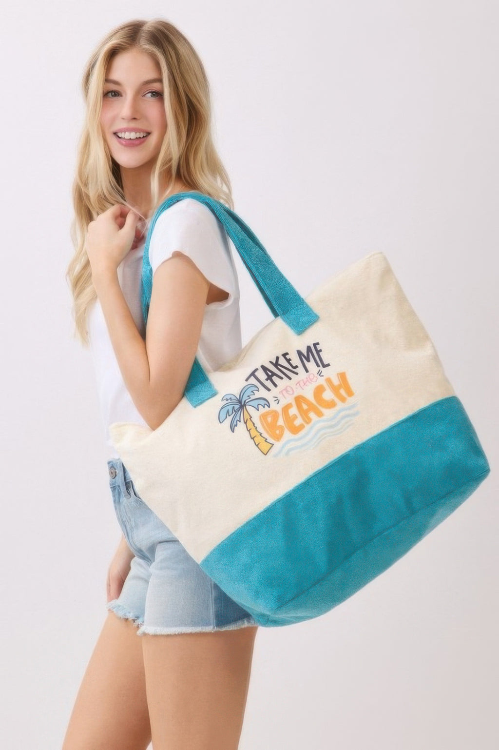 Take Me To The Beach tote bag with logo print, cream body and teal lower panel