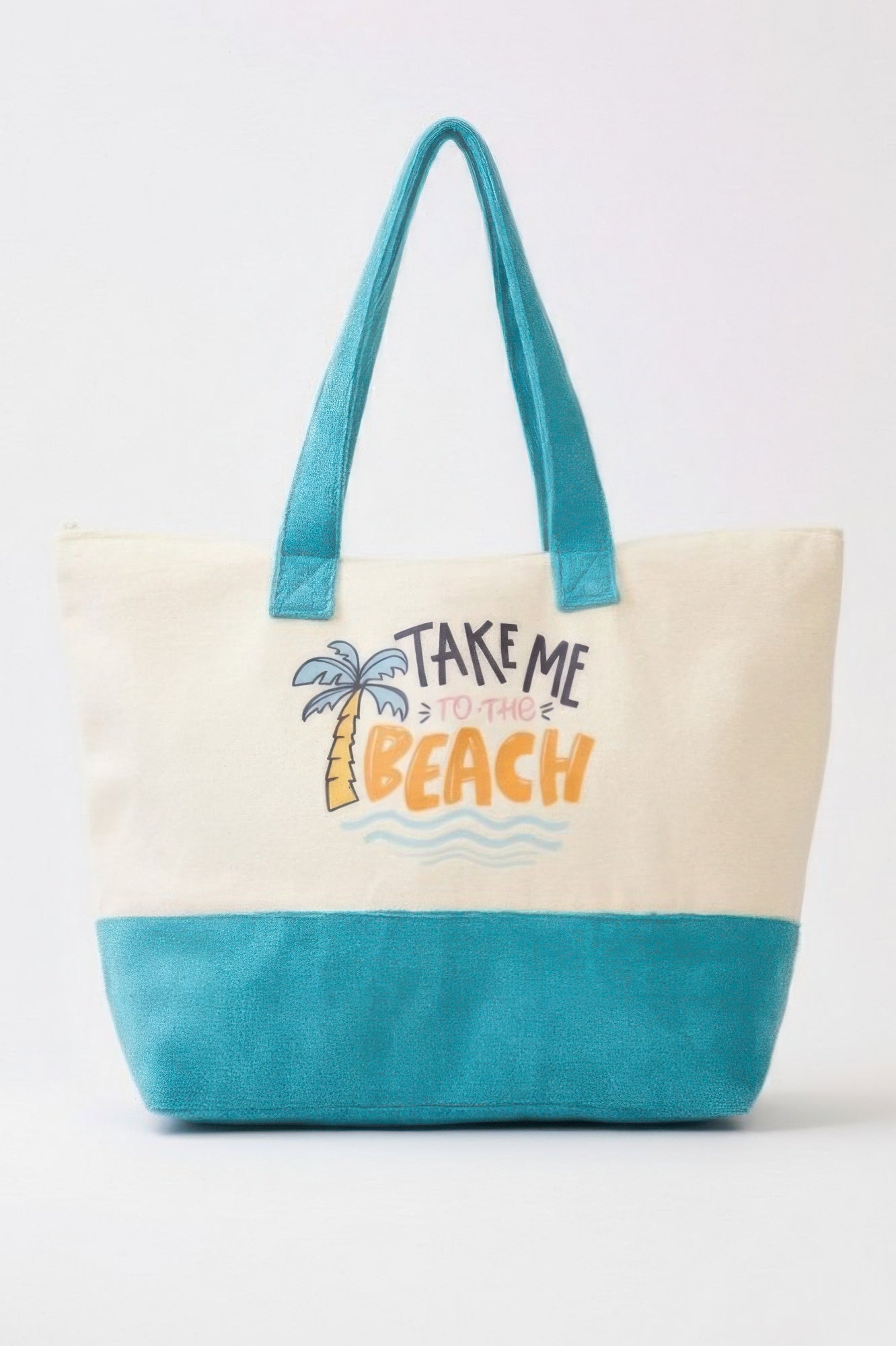 Take Me To The Beach tote bag on display, cream body with teal handles and base