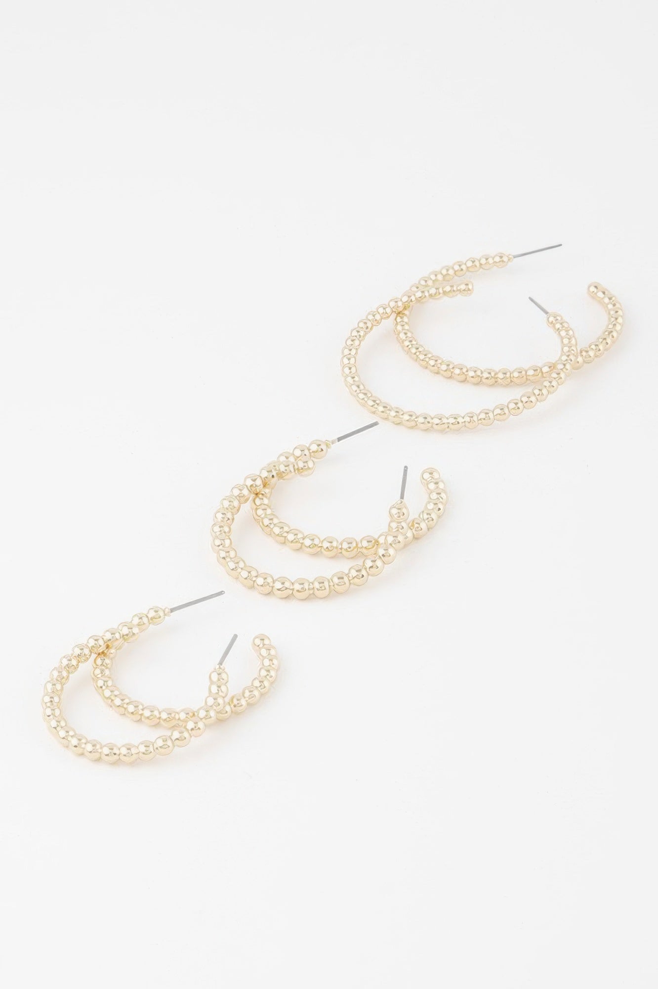 Gold pearl bead open hoop earrings, three hoops shown with hinged clasps
