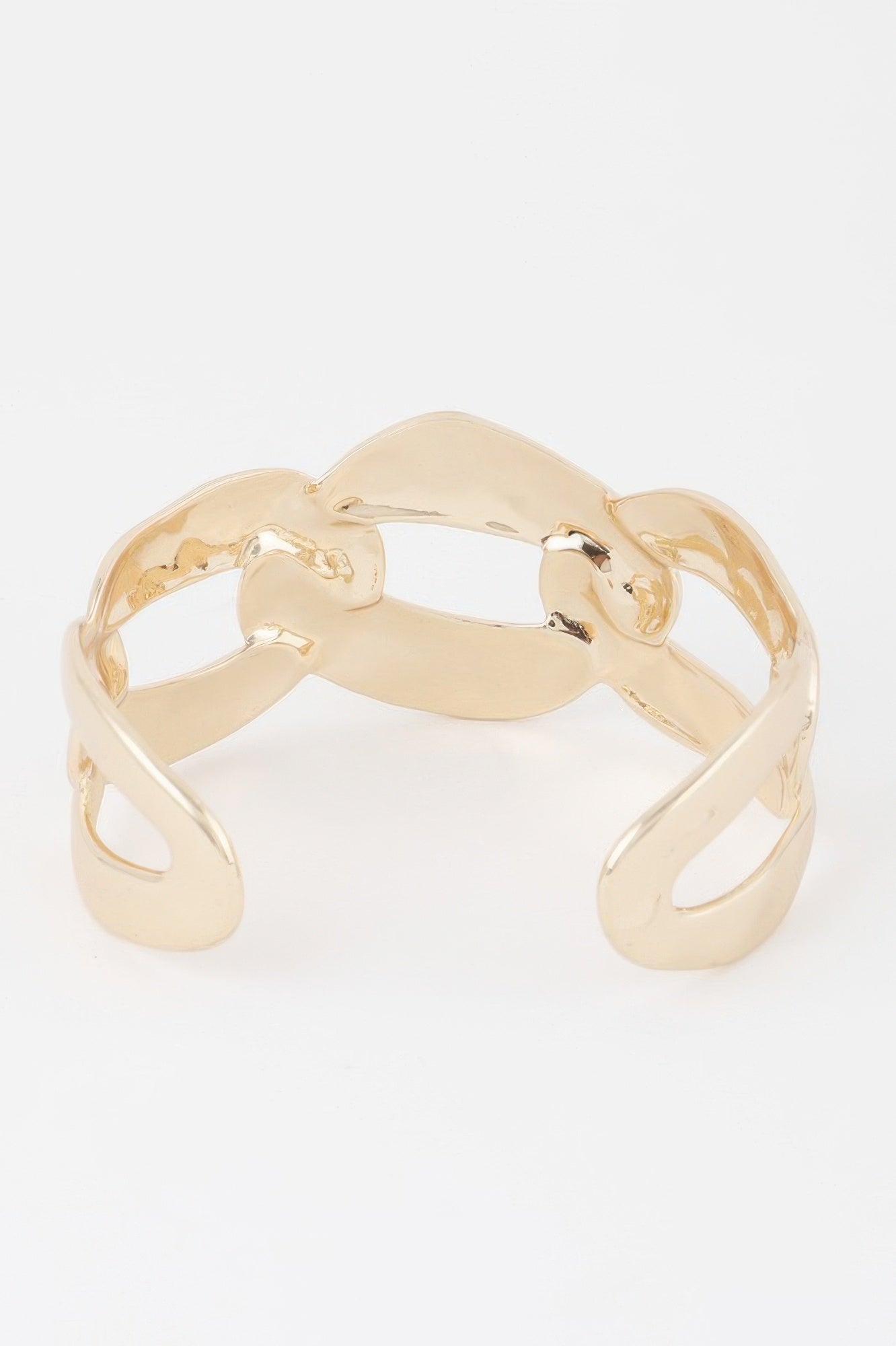Gold-tone openwork cuff bracelet with polished curved links