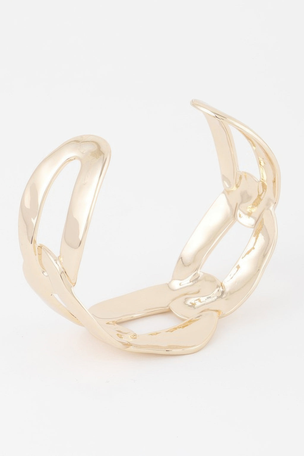 Gold-tone openwork cuff bracelet, side view of curved open links