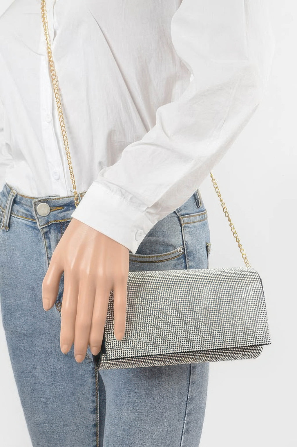 Rhinestone Party Clutch held in hand, silver rhinestone mesh and gold chain
