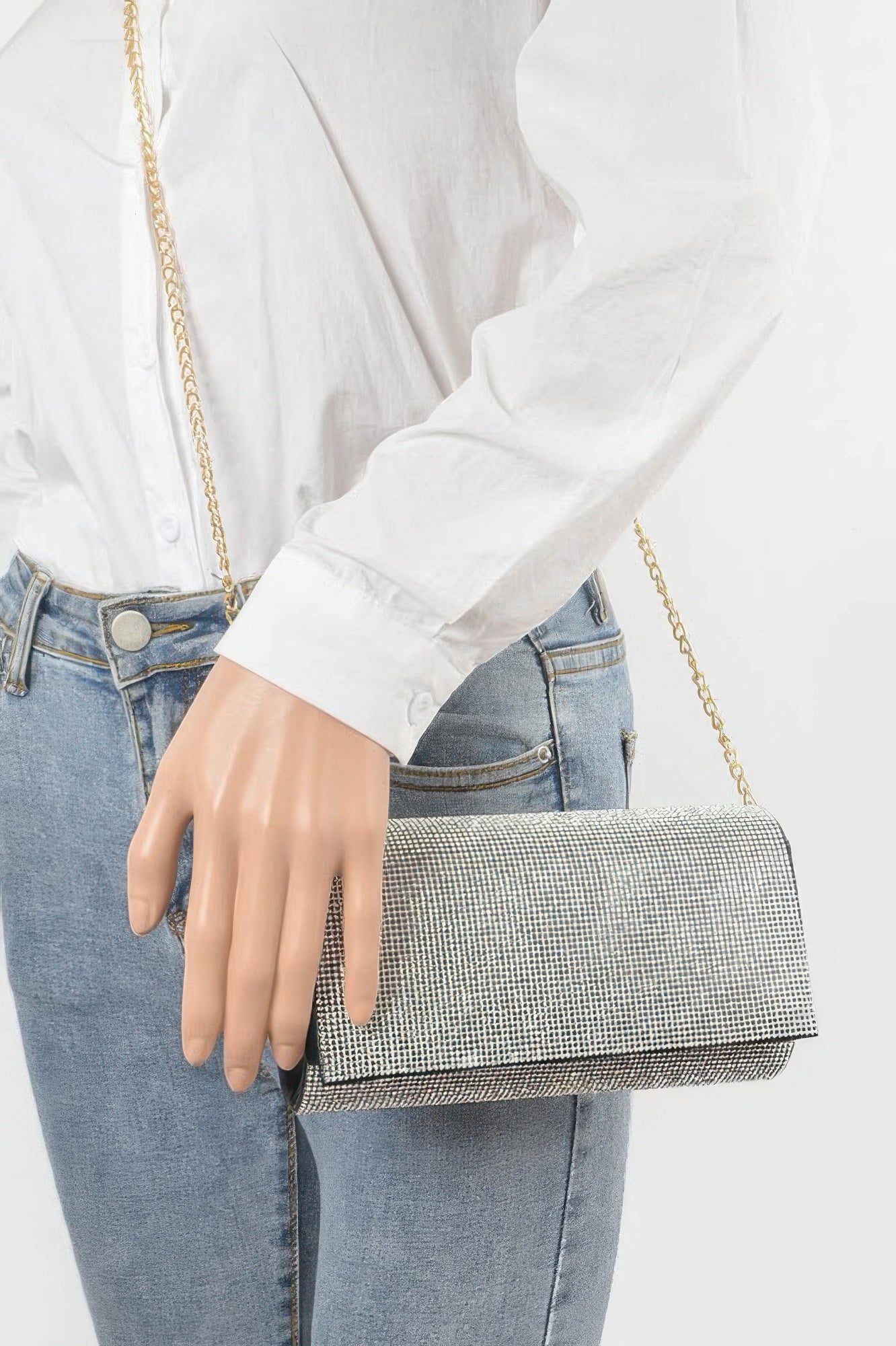 Rhinestone Party Clutch held in hand, silver rhinestone mesh and gold chain