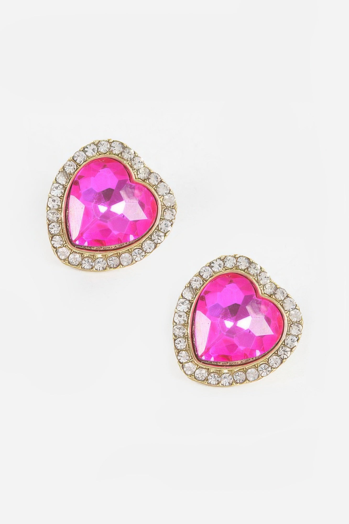 Heart-shaped stone earrings with fuchsia/pink gem and gold-tone crystal frame