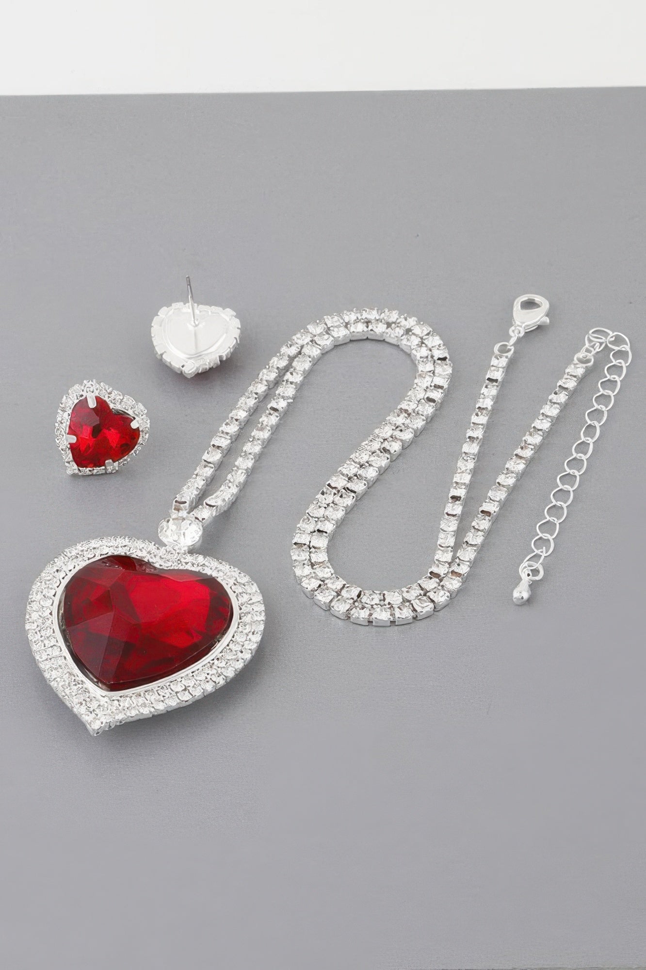 Red heart necklace set: silver link chain with large red faceted heart pendant
