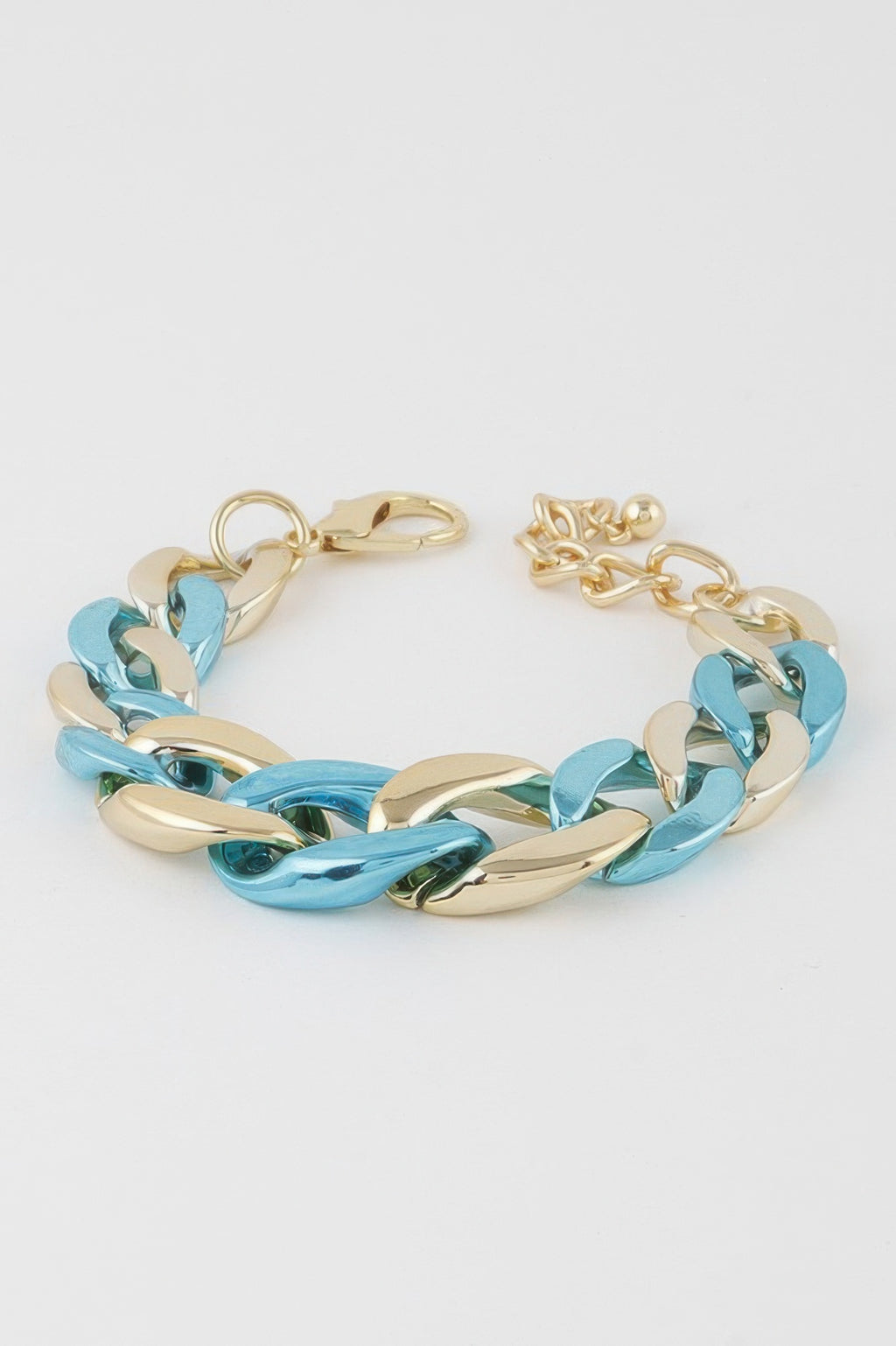Twisted chain bracelet with gold and turquoise links, lobster clasp visible