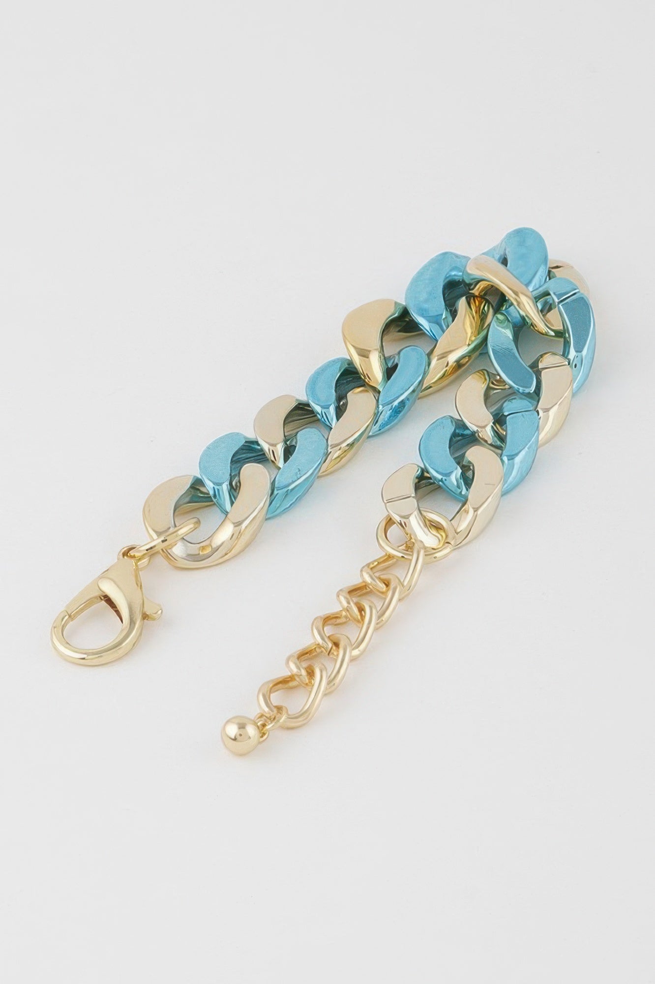 Twisted chain bracelet with gold hardware and turquoise links, extender chain