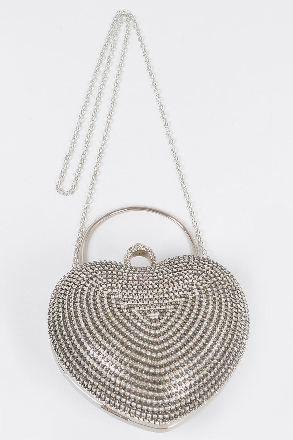 Heart-shaped rhinestone clutch with top handle loop and long chain strap, silver-tone