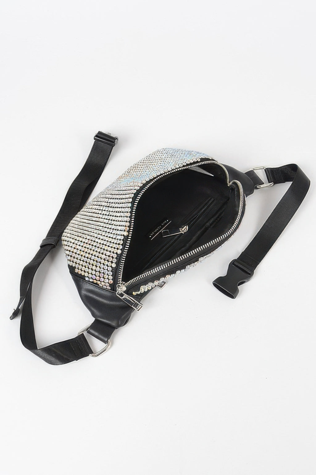 Rhinestone mesh fanny pack side view, silver rhinestone band and front zip pocket