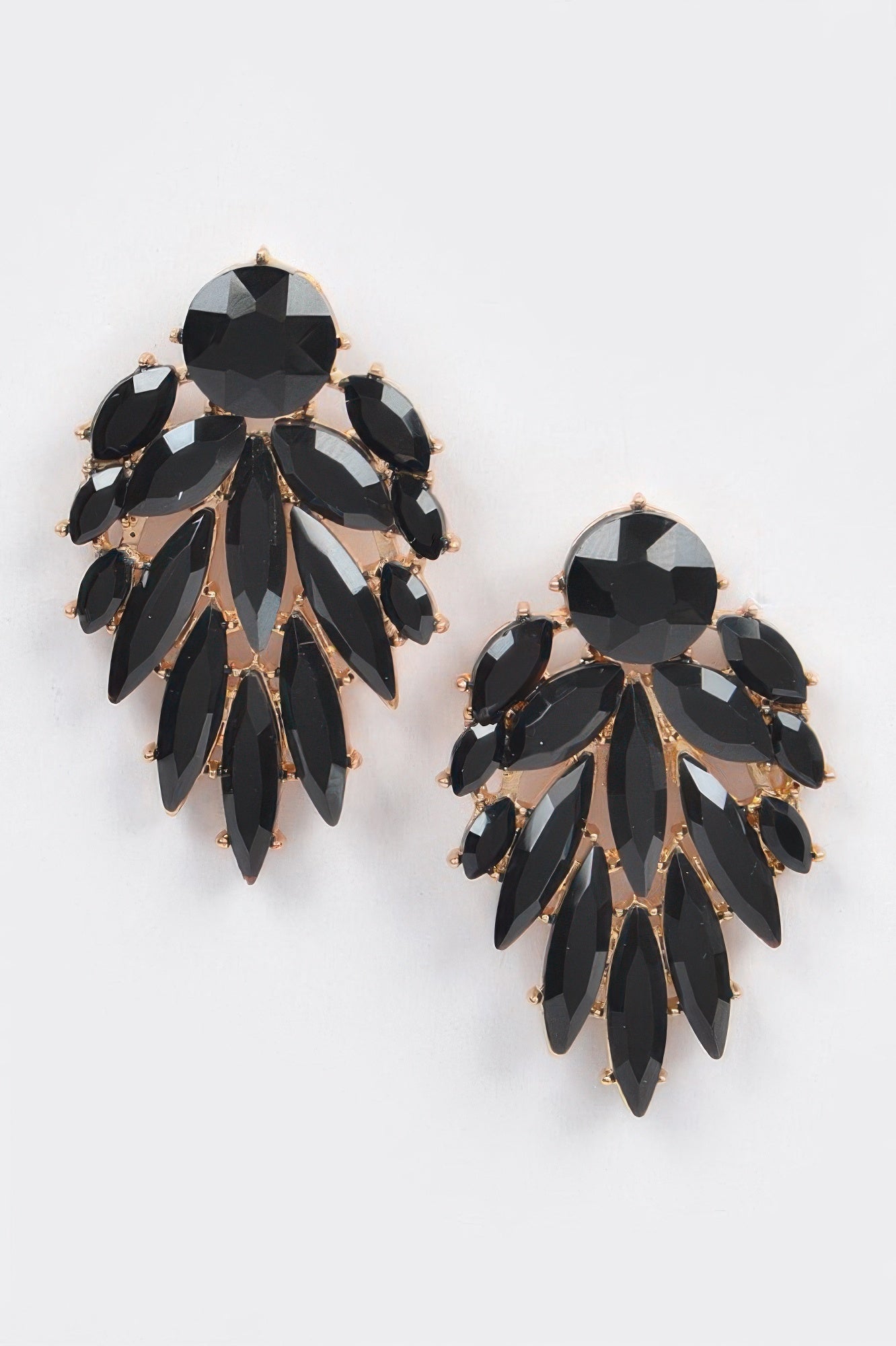 Leaf dangle gem earrings with dark black leaf-shaped crystals and gold-toned settings