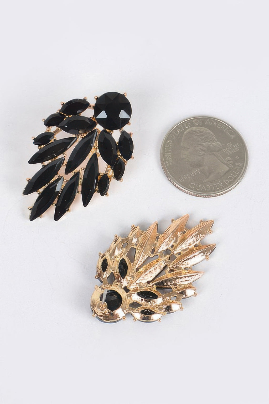 Leaf dangle gem earrings, black leaf crystal cluster with gold-toned detail