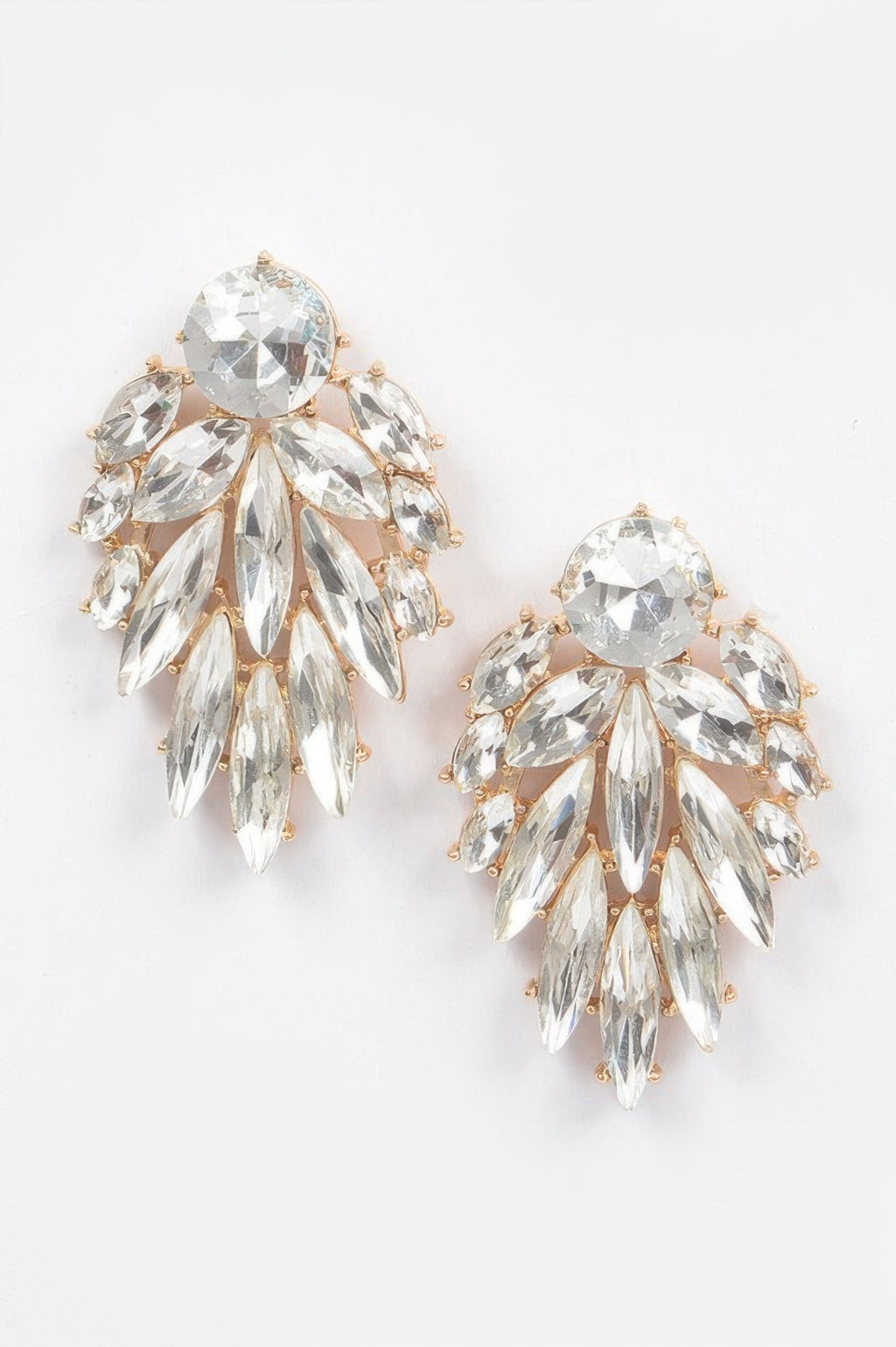 Leaf dangle gem earrings with clear crystal leaf drops and gold-toned hardware