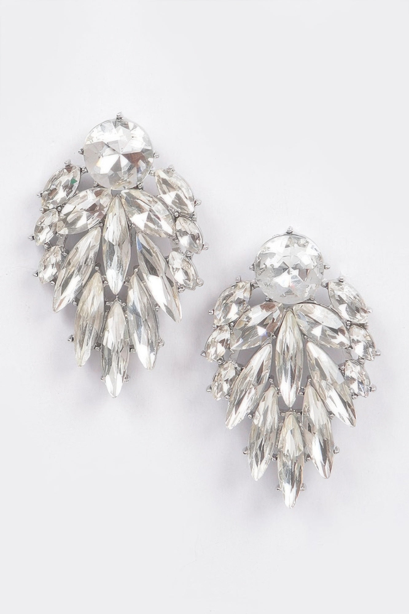 Leaf dangle gem earrings with clear round center and dangling crystal leaf pieces