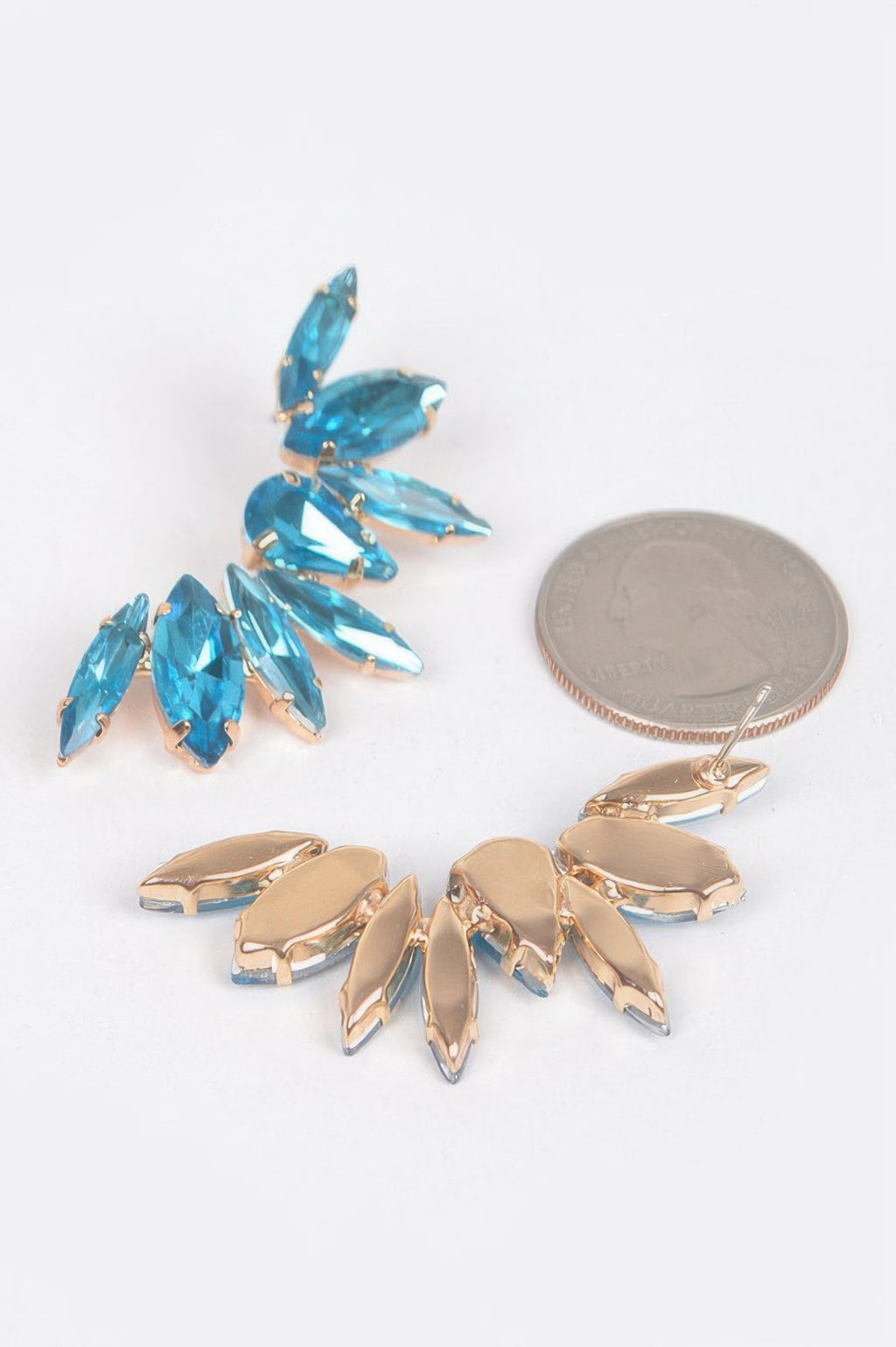 Rhinestone earrings with light-blue marquise stones and gold-tone backs