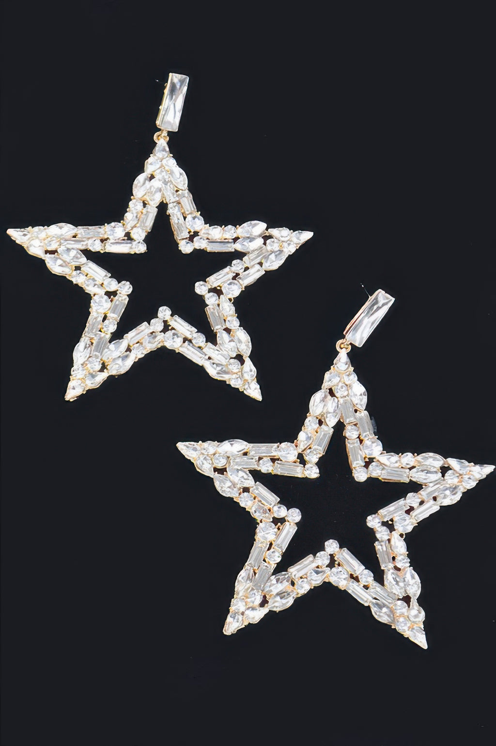 Starlight earrings in silver tone, dangling star with clear rhinestone details