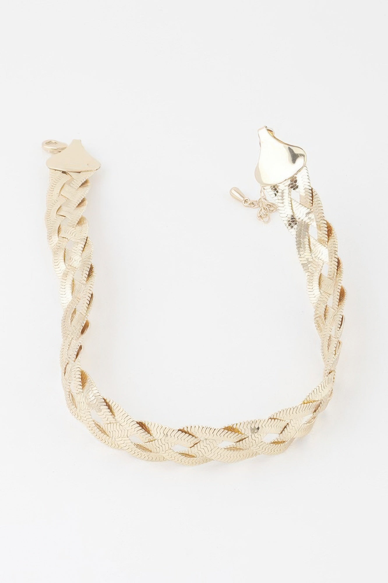 Gold-toned U-shaped triple snake-braid chain necklace with clasp