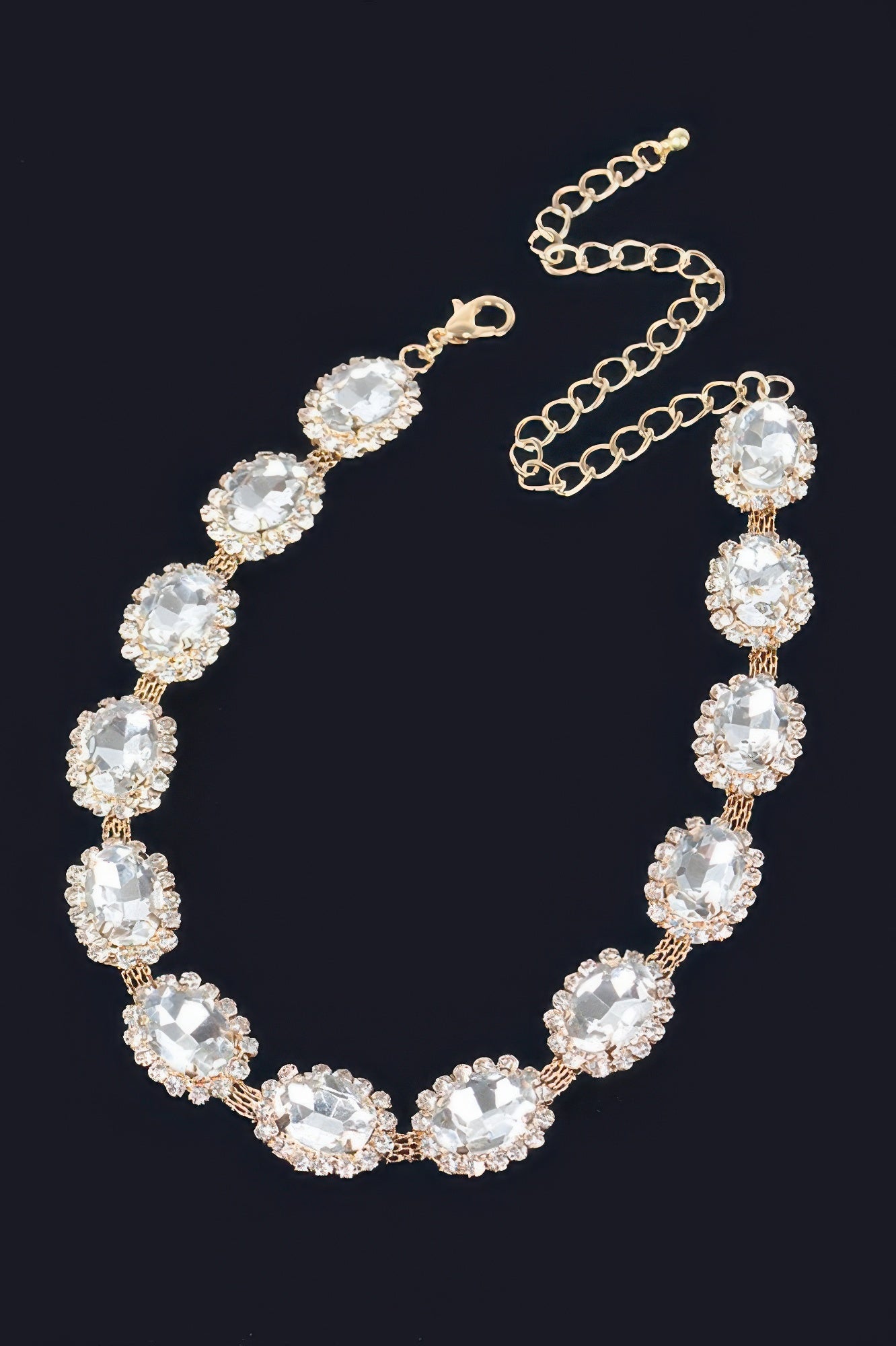 Rhinestone oval necklace, gold-tone chain with large clear oval crystal links.