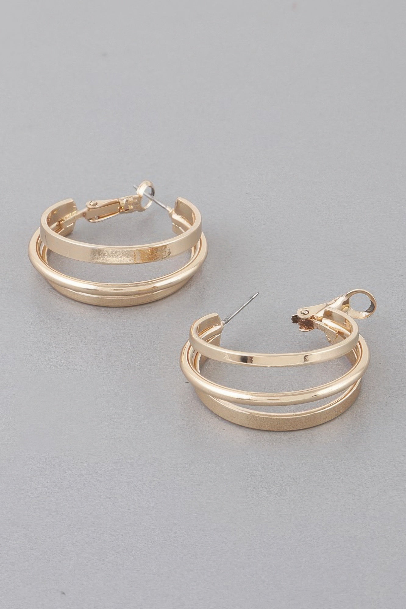 Interlaced hoop earrings, gold-tone triple ring design