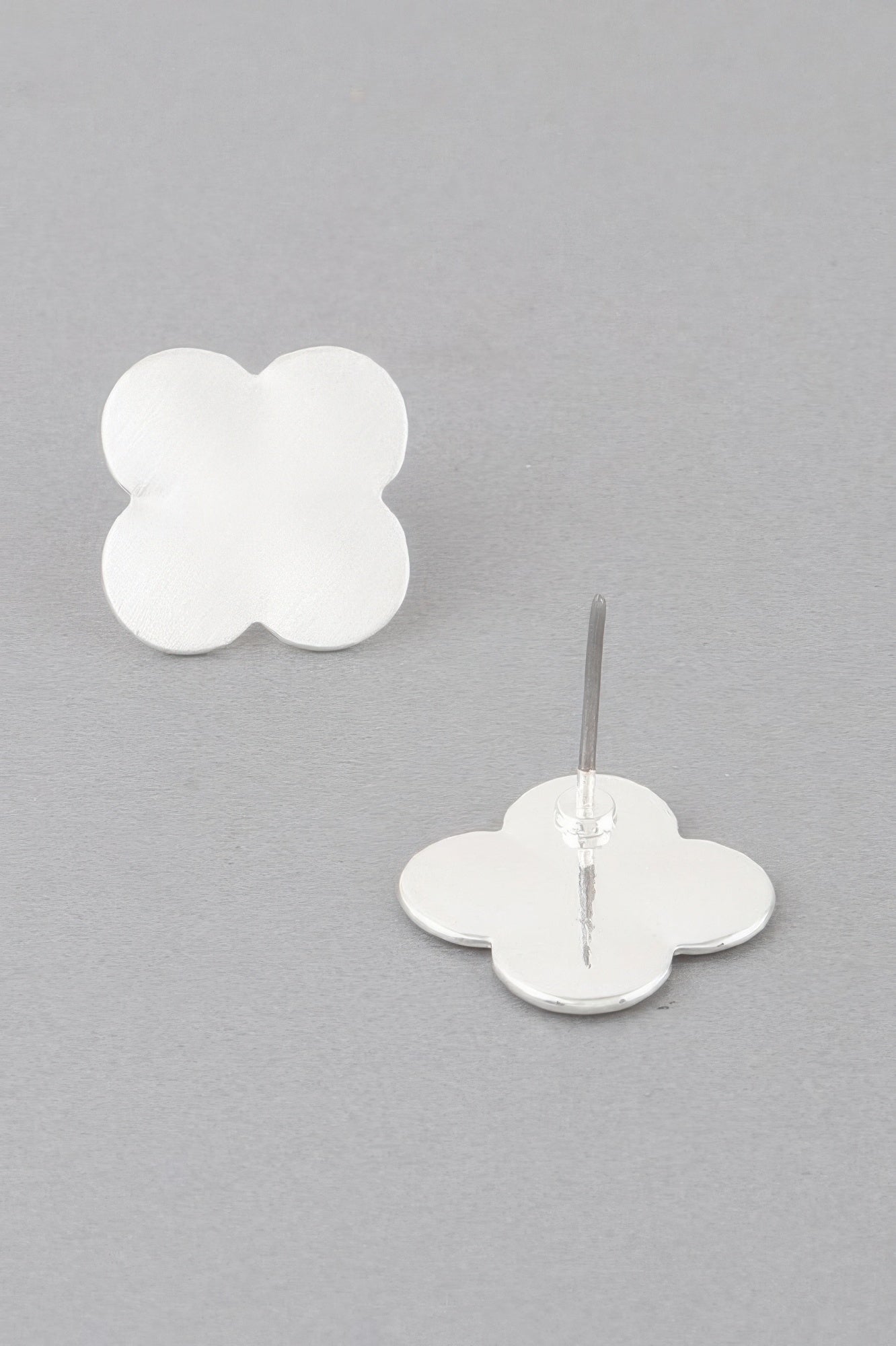 Clover stud earrings in silver tone, four-petal clover with visible post