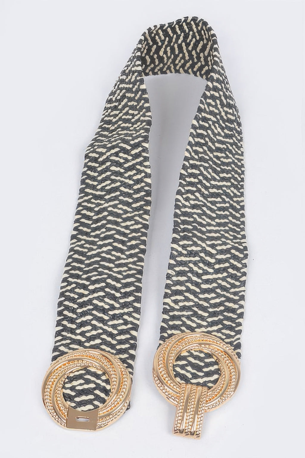 Dark patterned stretch waist belt with two round metal buckle ends and long strap tails