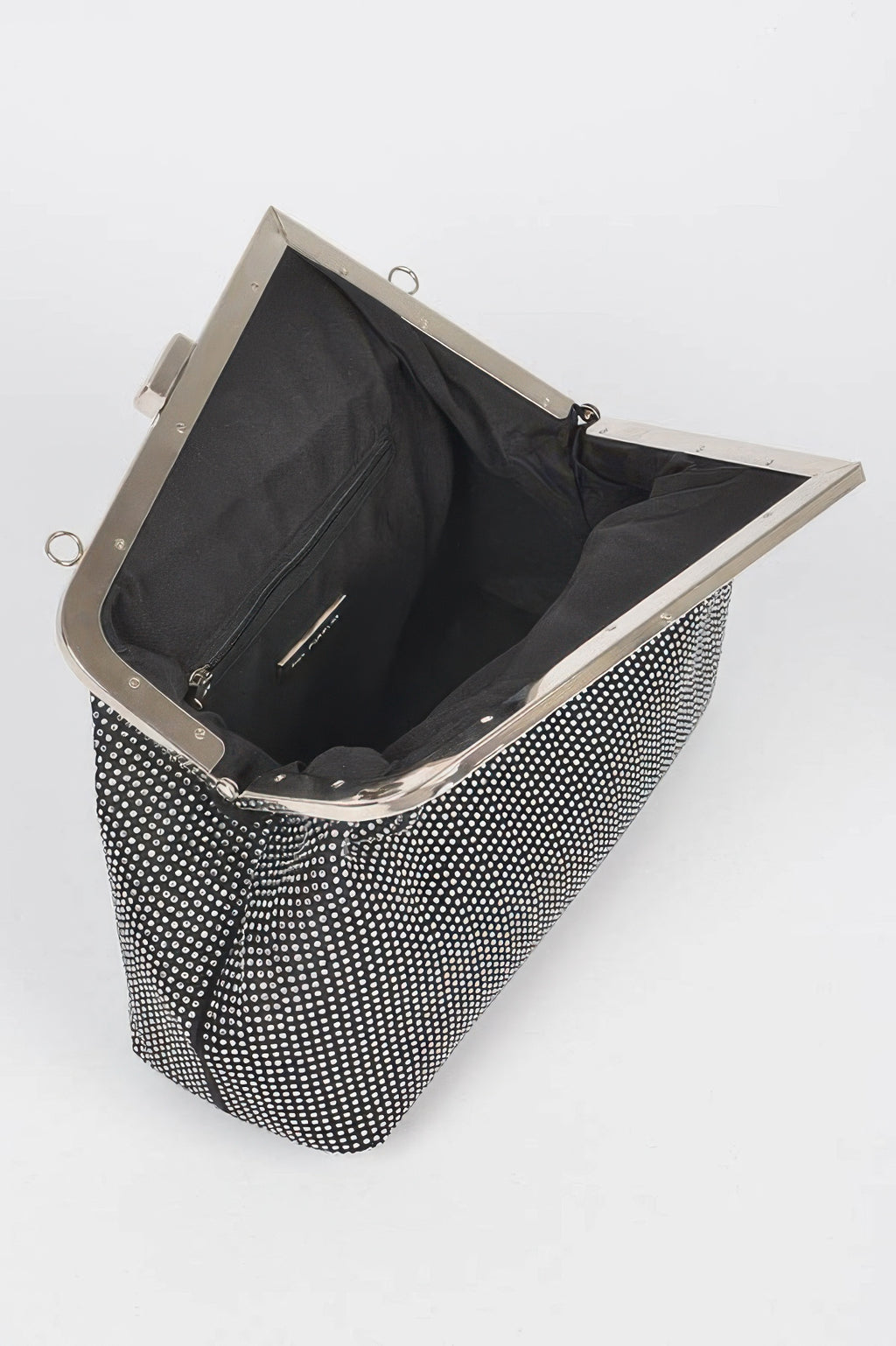 Black rhinestone frame clutch open, shows black satin lining and inner zip pocket