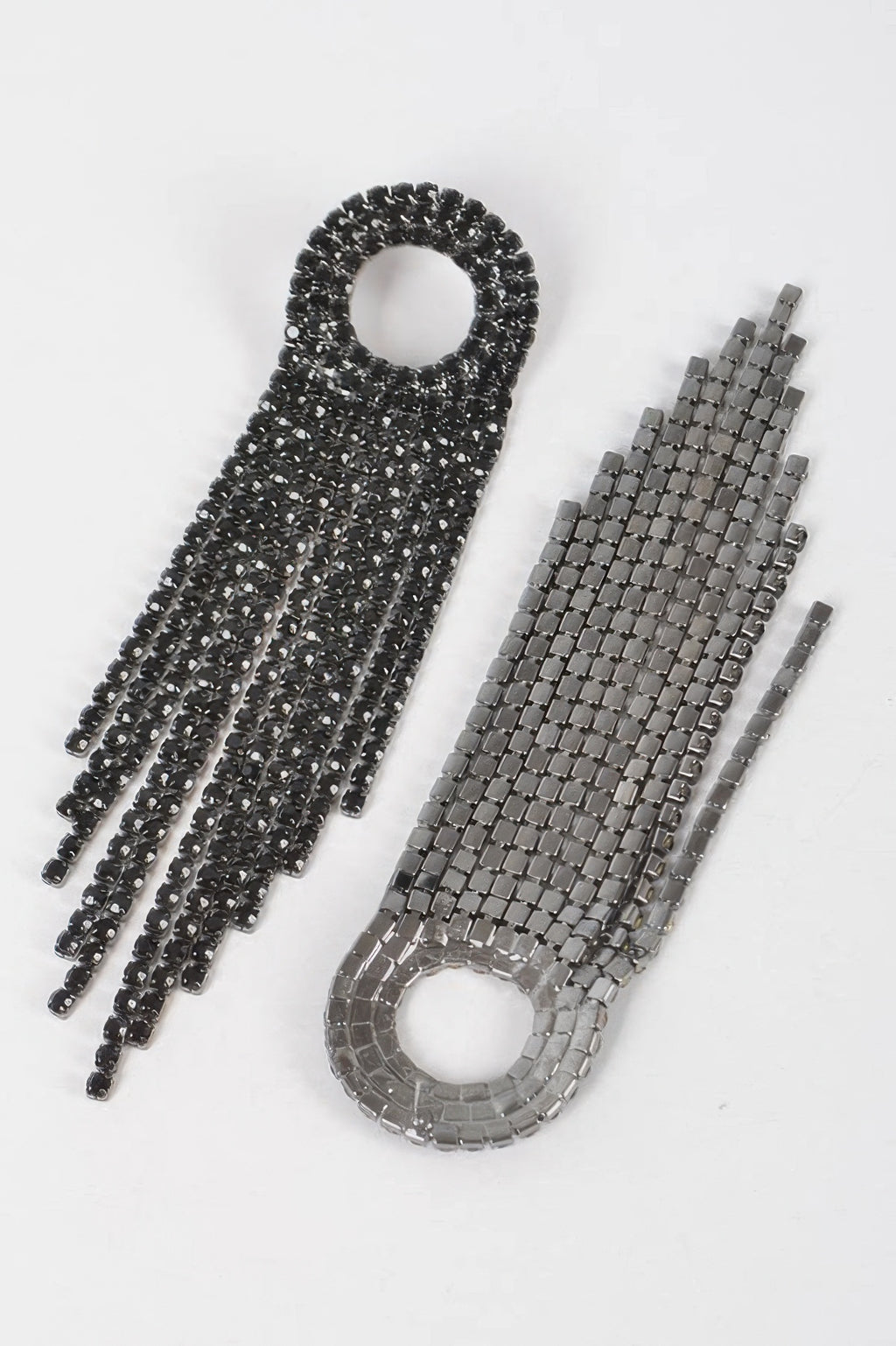 Black and silver-toned rhinestone fringe earrings with round top hoops and tassel drops
