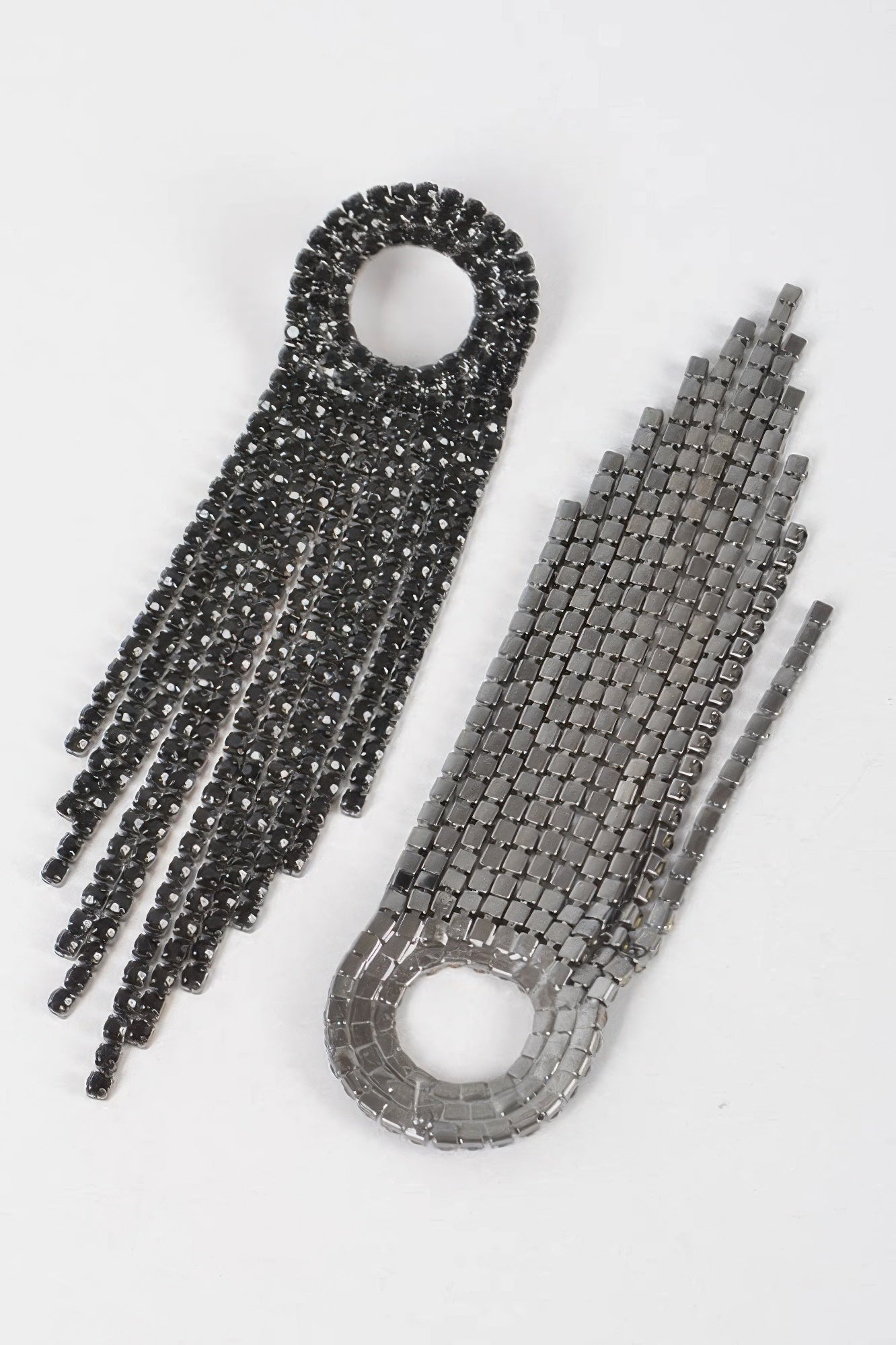 Black and silver-toned rhinestone fringe earrings with round top hoops and tassel drops