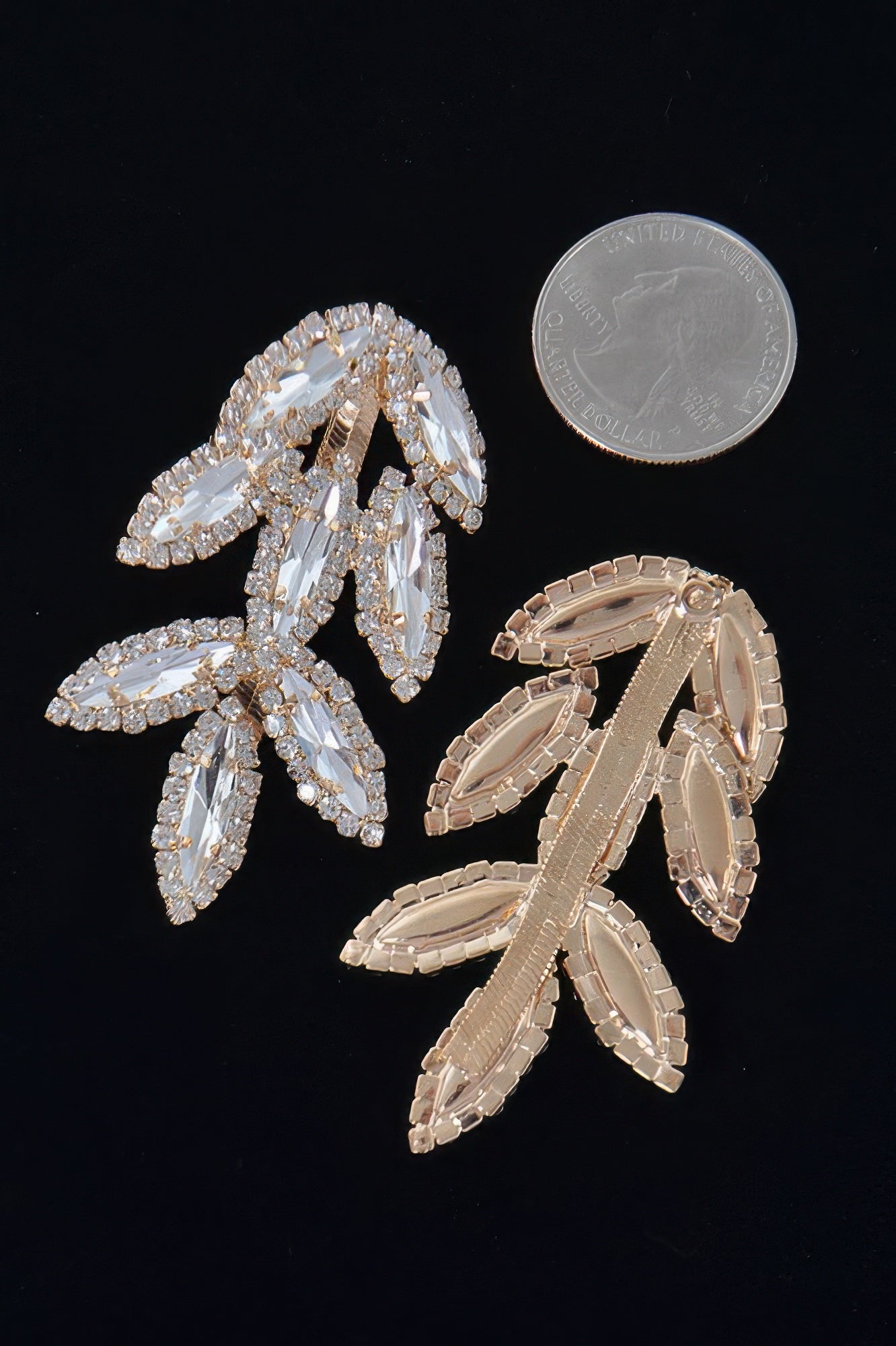 Silver rhinestone leaf earrings, side view with sparkling marquise stones
