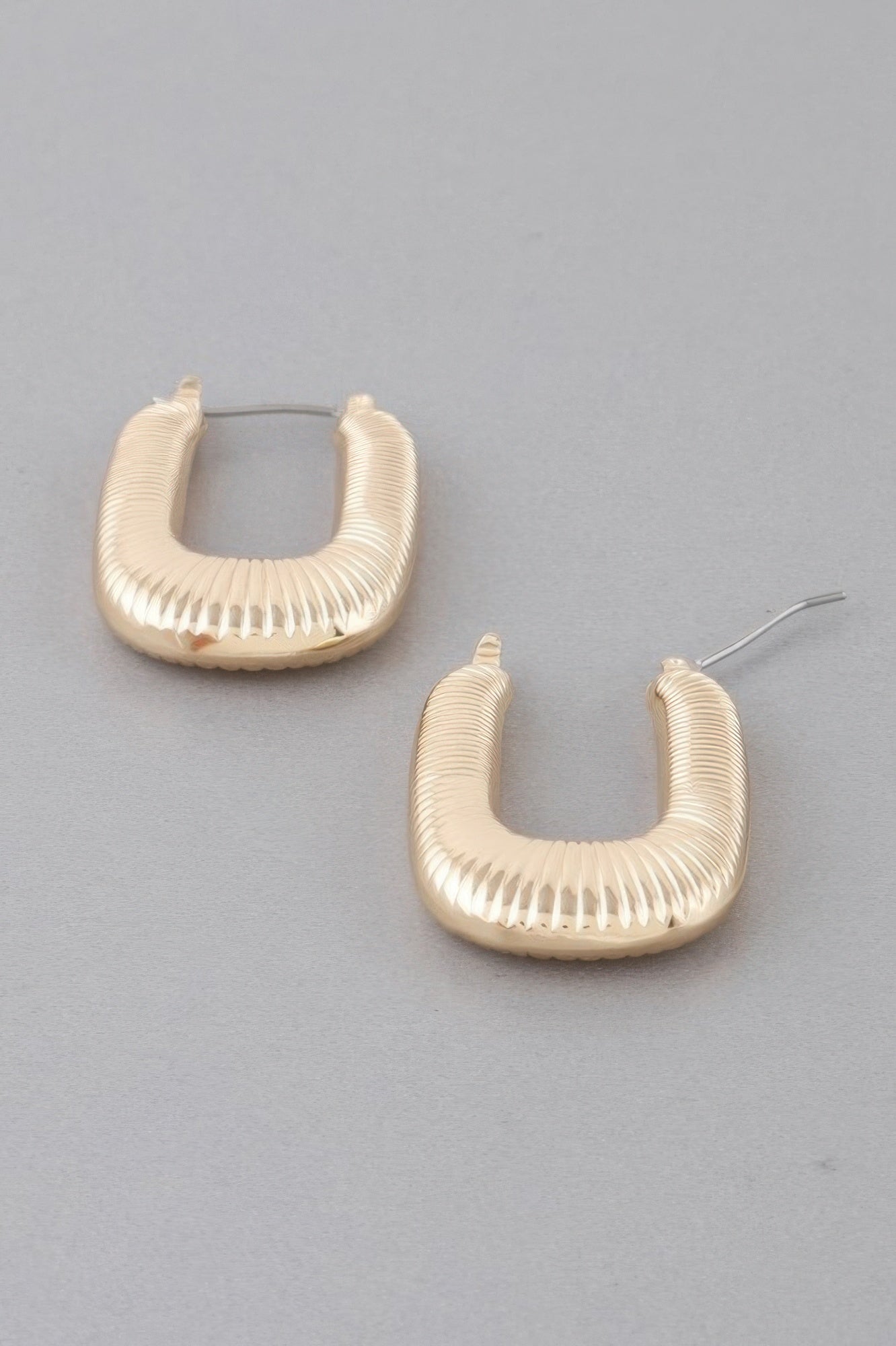 Metal medium textured hoop earrings, gold-tone with ribbed finish