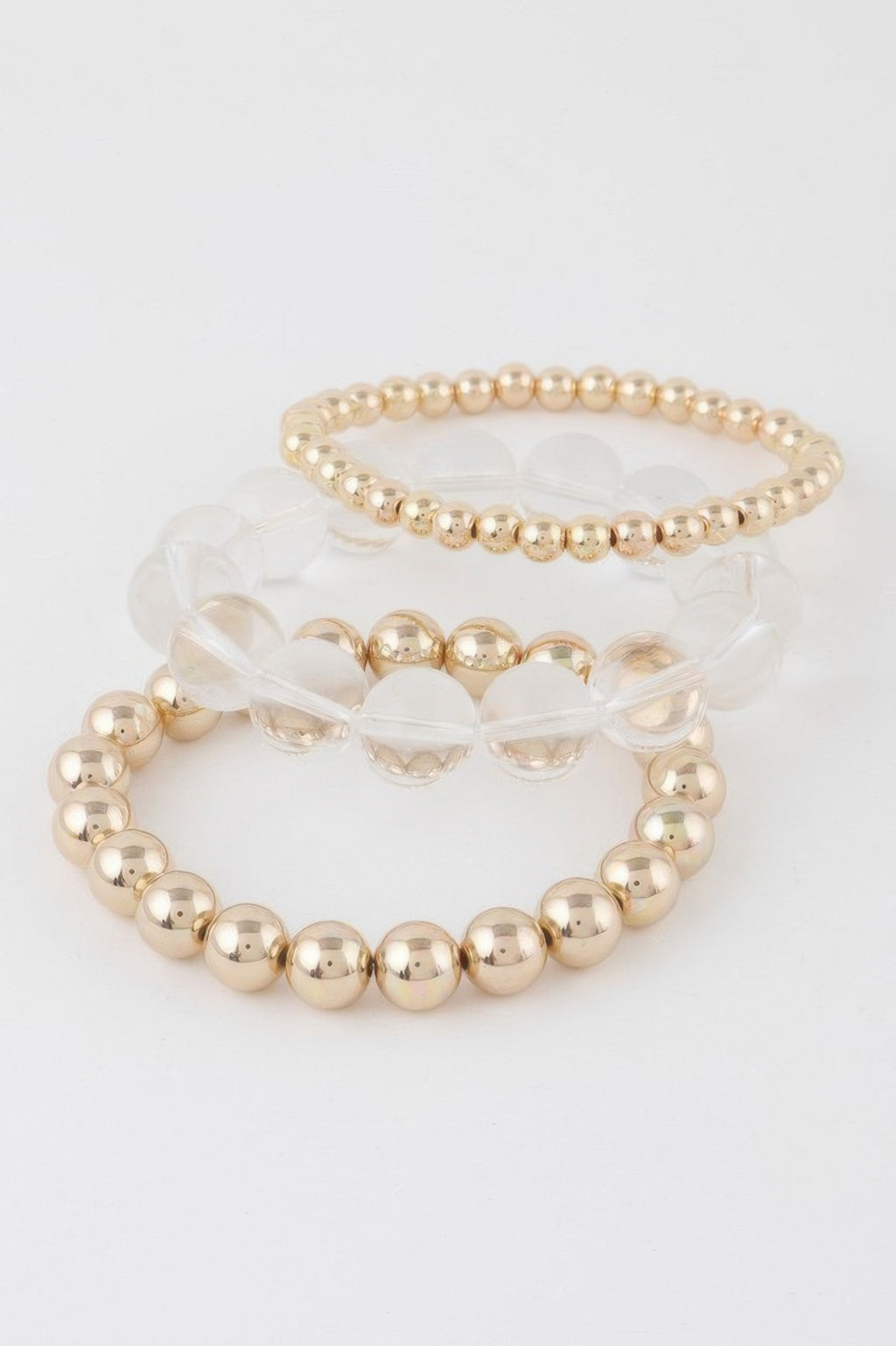 Gold clear triple beaded bracelet set: three rings of round beads, slim fit
