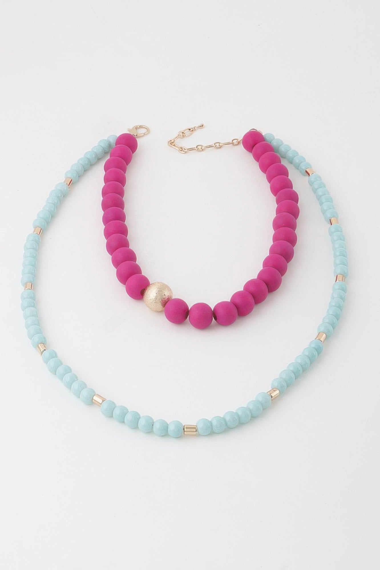 Two-toned long beaded necklace set, fuchsia-pink and light blue bead strands