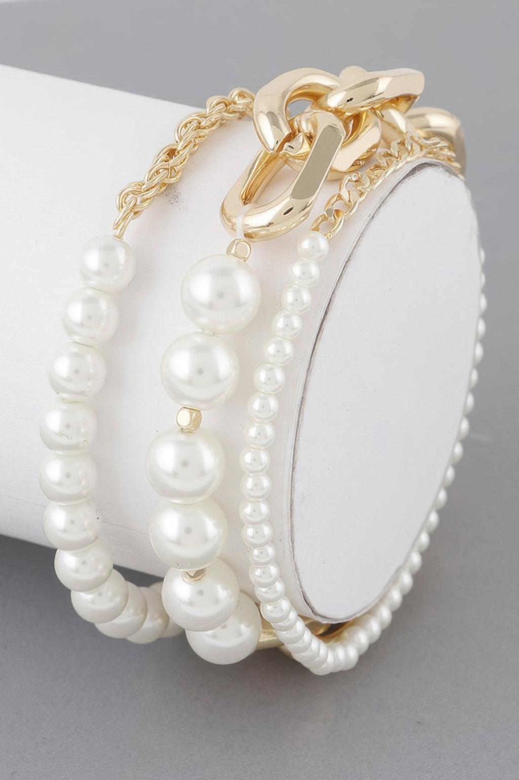 Multi Pearl Chain Bracelet: gold-tone chain with round white pearls and link clasp