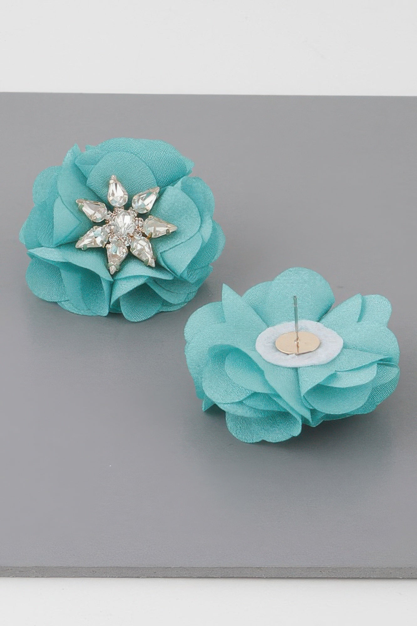 Mint jeweled flower stud earrings with rhinestone center and metal post
