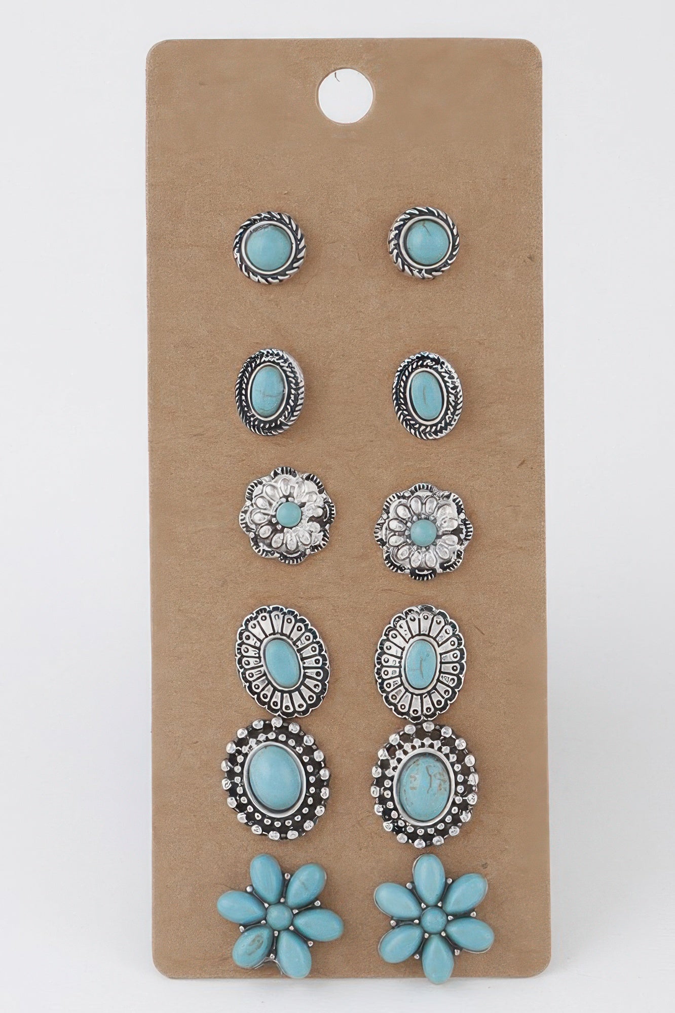 Antique flower stud earring set with turquoise cabochons and silver-toned details