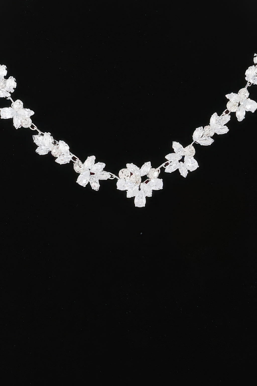 Crystal flower charm necklace—silver-tone clear crystal flowers in a row