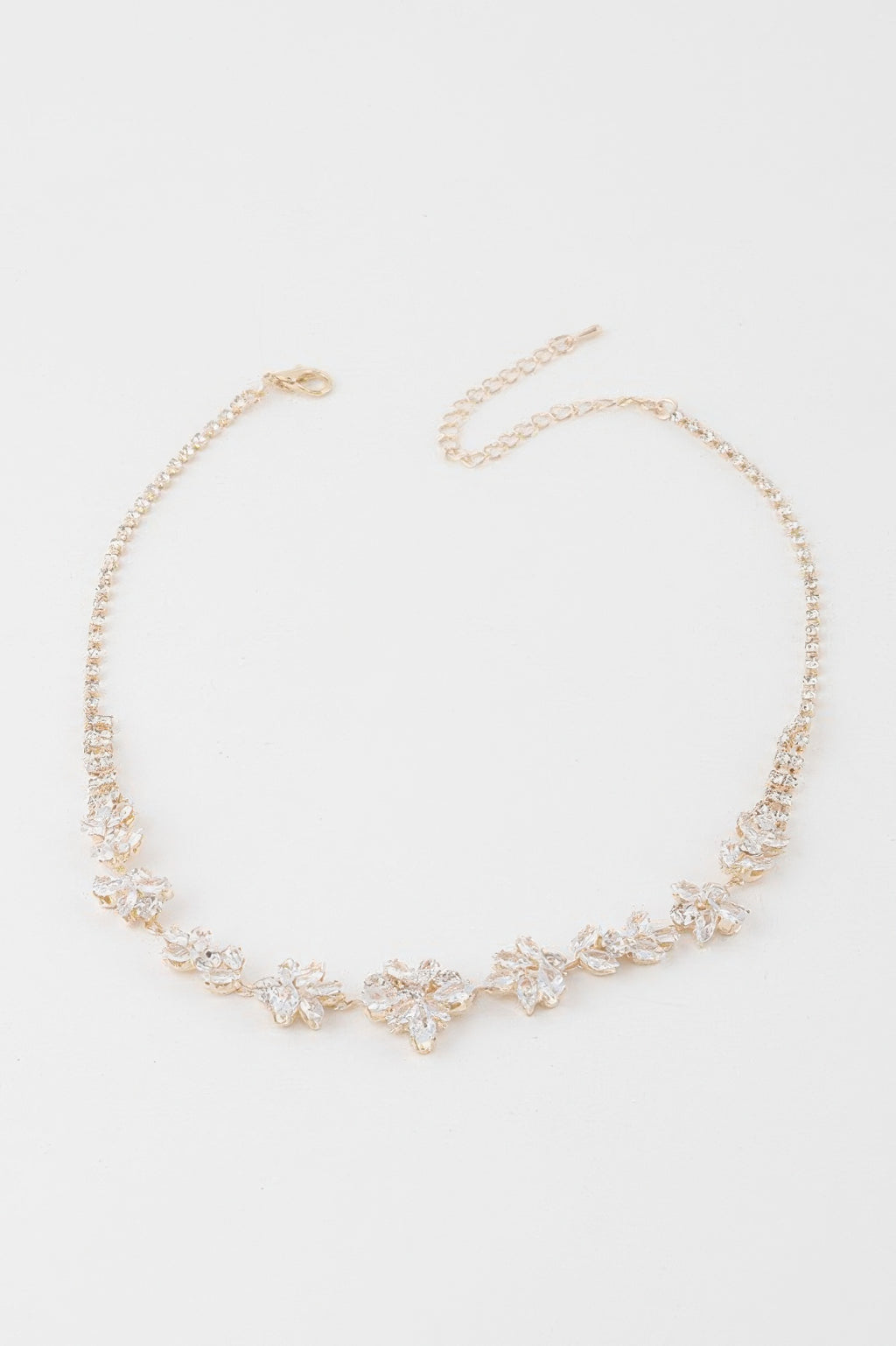 Crystal flower charm necklace with clear stones and gold-tone chain
